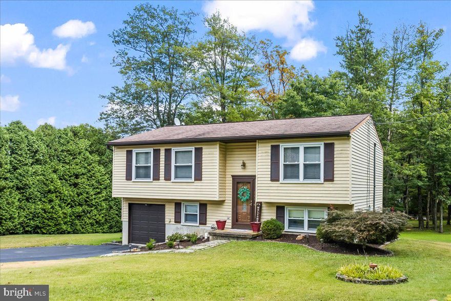 Home at last! This turnkey single-family residence offers the perfect blend of privacy and convenience in the heart of Dillsburg. The pride of ownership shines through with its tasteful color palette and like-new carpeting.

Step into the soaring two-story foyer leading to a bright living room accented by a large bay window. The dining area flows seamlessly into the kitchen with direct access to a 14’ x 8’ covered deck—perfect for relaxing or entertaining outdoors. The main level hosts three bedrooms and a full bath.

The versatile lower level provides a spacious family room, ideal for a home office or playroom, along with another full bath, laundry area with extra storage, and interior access to the one-car garage. Outside, enjoy a large backyard, beautiful covered deck, and extended driveway.

With USDA $0 down options and strong VA buyer appeal, this home opens the door to affordable ownership without compromise. Don’t miss this move-in ready home with flexible spaces and modern comfort—schedule your showing today!