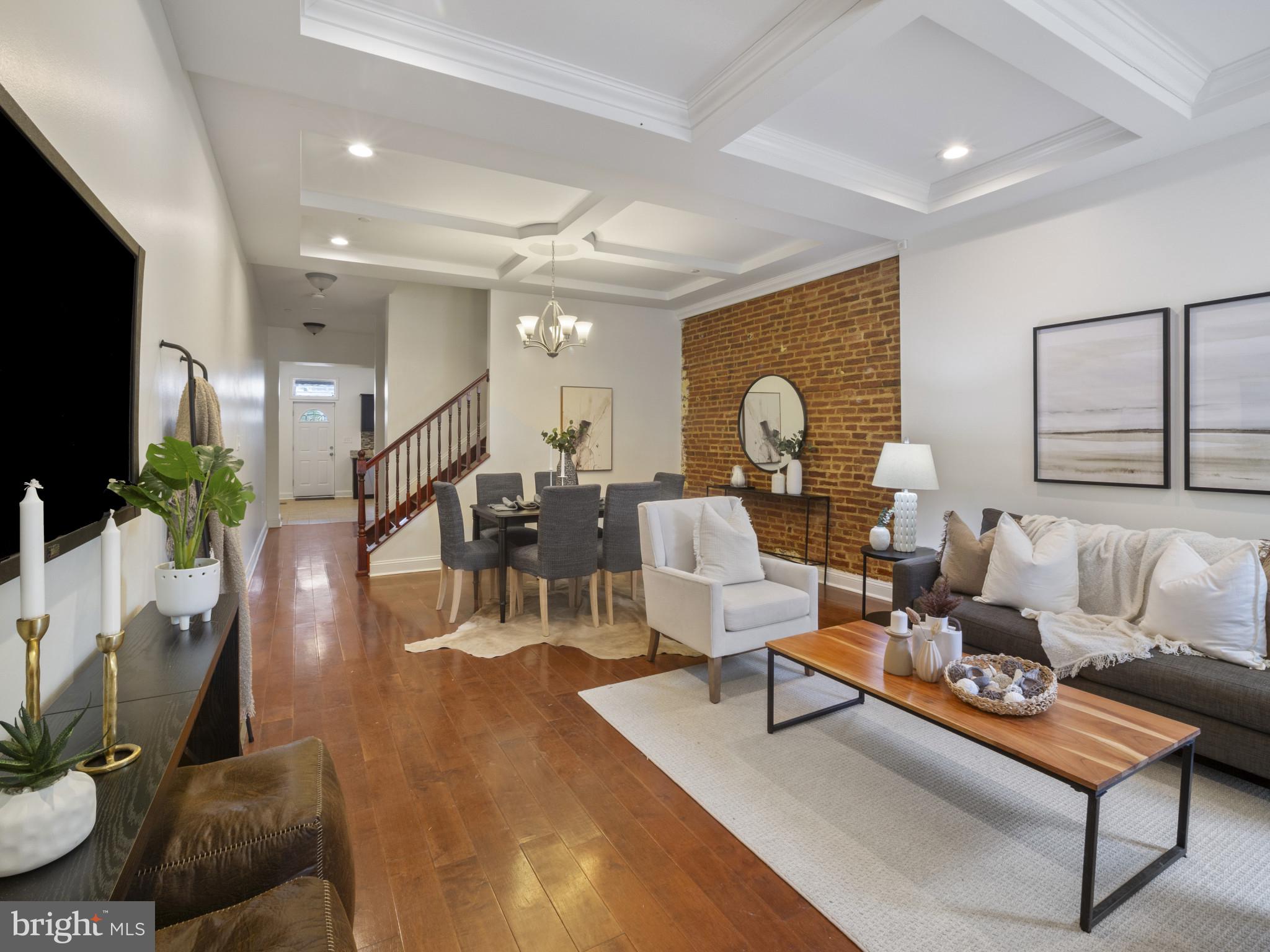 This massive home literally has it all right down to all of the original charm and now it can be ALL YOURS. This would be IDEAL for ANY situation because all of the rooms are HUGE with closets and bathrooms and everyone is a 30 second walk to Hopkins!
From stunning hardwood flooring beautiful exposed brick, trey ceilings, fully finished basement, huge kitchen, multiple decks, huge bedrooms and a stunning primary suite you don't want to miss out. Best yet other than the walkability, the street is beautiful, tree lined and QUIET! CALL TODAY for your private tour.