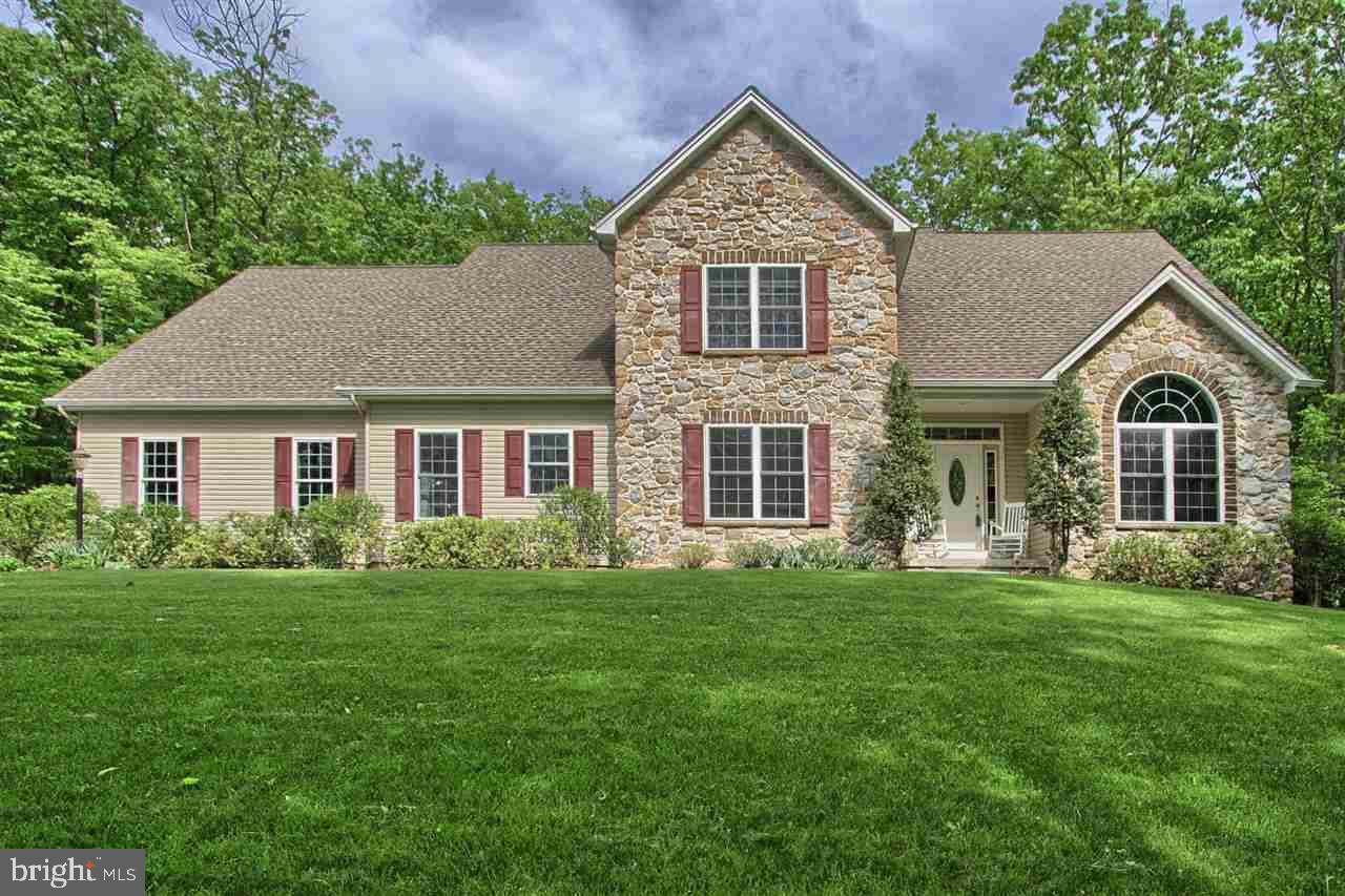 Over 5000 finished sqft, dynamic 1st-flr MBR layout, lavish upgrades, private 2.25ac homesite, CV Schools! Gorgeous ceiling lines, soaring vaulted spaces, superb natural light. Magnificent grt rm w/towering flr-to-ceil FP. Beautiful kit w/abundant maple cabs, Corian, ceramic bcksplsh w/inlay, brkst area. 1st-flr mbr w/sumptuous 5-piece bath. Fin LL w/wet bar, bath, rec area. Sprawling tiered deck overlooks serene, treed homesite