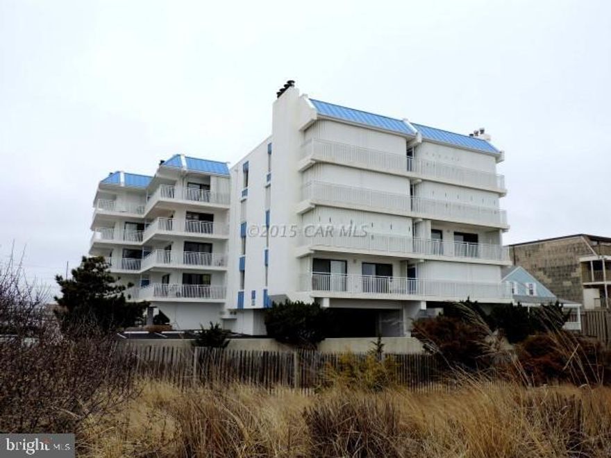 Elevated first floor unit with sweeping views of ocean from double sliding glass doors in sought after North beach location. Fully furnished 2 BR, 2 BA unit in well maintained building with recent new railings, roof & elevator. Additional features include full-size laundry,storm shutters and 2 assigned parking places and neutral decor. Don't miss this!