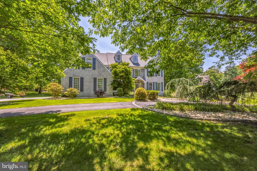 Welcome to this stunning custom-built home nestled in a quiet cul-de-sac neighborhood surrounded by mature trees. As you step through the front door, you are greeted by a grand two-story tiled foyer that sets the tone for the elegance and sophistication found throughout the house. The foyer features a front staircase leading to the second floor, where you can look down and admire the intricate details below. 

The main level boasts a formal living room and dining room, both adorned with elegant wainscoting and one of the home's two marble gas fireplaces, perfect for cozy gatherings. The expansive two-story family room is a showstopper with its tall windows that flood the space with natural light, creating a bright and inviting atmosphere. Adjacent to the family room, you'll find a dedicated study, ideal for a home office or library.

The heart of the home is undoubtedly the large gourmet kitchen, designed to delight any chef. It features an expansive island with granite countertops, a double oven, a Viking stove top with a built-in gas grill, and abundant tall cabinets for all your storage needs. The kitchen seamlessly flows into a sunlit breakfast area, making it the perfect spot for morning coffee.

French doors from the kitchen open onto a large custom-built patio with intricate pavers, offering an exceptional space for outdoor entertaining. The patio overlooks the beautifully landscaped backyard, providing a serene retreat for relaxation.  Stucco inspection was done prior to home hitting the market and all repairs completed.  Report and receipt will be uploaded and available.

The main level also includes a walk-in pantry, a laundry and mudroom for convenience, and a second staircase at the back of the house for easy access to the upper level.

Upstairs, you will find four generously sized bedrooms, each designed with comfort in mind. The highlight is the extra-large master suite, featuring two walk-in closets and a bonus room that can be used as a workout space or a private dressing room. The luxurious master bathroom is a haven of relaxation with a jacuzzi tub, double sinks, a large wall mirror, a built-in makeup table, and a private toilet area. Two additional full bathrooms and a half bathroom ensure ample space for family and guests.

This home also includes a three-car garage and an expansive walkout unfinished basement, offering endless possibilities for customization. The circular front driveway and covered porch add to the home's curb appeal, making a grand statement from the moment you arrive.

Don't miss the opportunity to own this exquisite property, where every detail has been thoughtfully designed to create a perfect blend of luxury and functionality.