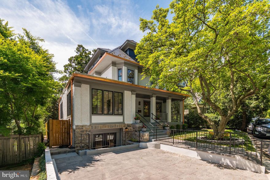 Exquisite renovation of a Craftsman American Foursquare by DILAN HOMES! *DREAM​* location on tranquil Highland Place, a hidden-in-plain-sight "country lane" and historic Cleveland Park's most-cherished street! A wide front porch leads to an expansive interior of nearly 6,000 SF with ample communal/family space, wonderful indoor-outdoor social flow, 9'7" ceilings, and streaming sunlight and leafy views through countless large windows - all pristine and TURNKEY RENOVATED with impeccable finishes and details! 

Main level features living room with fireplace, dining room, open kitchen, family room, and multiple walkouts to the private south-facing backyard with outdoor kitchen! Second floor features multi-room primary suite with en suite bath and walk-in closet, two additional bedrooms, additional full bath, and laundry. Spacious third floor features 2 bedrooms, full bath, and open loft/sitting area. Lower level features bedroom with en suite bath and walk-in closet, large rec room, additional laundry, and powder room. Easy parking in wide driveway and just steps to schools, shopping, restaurants, metro, everything!