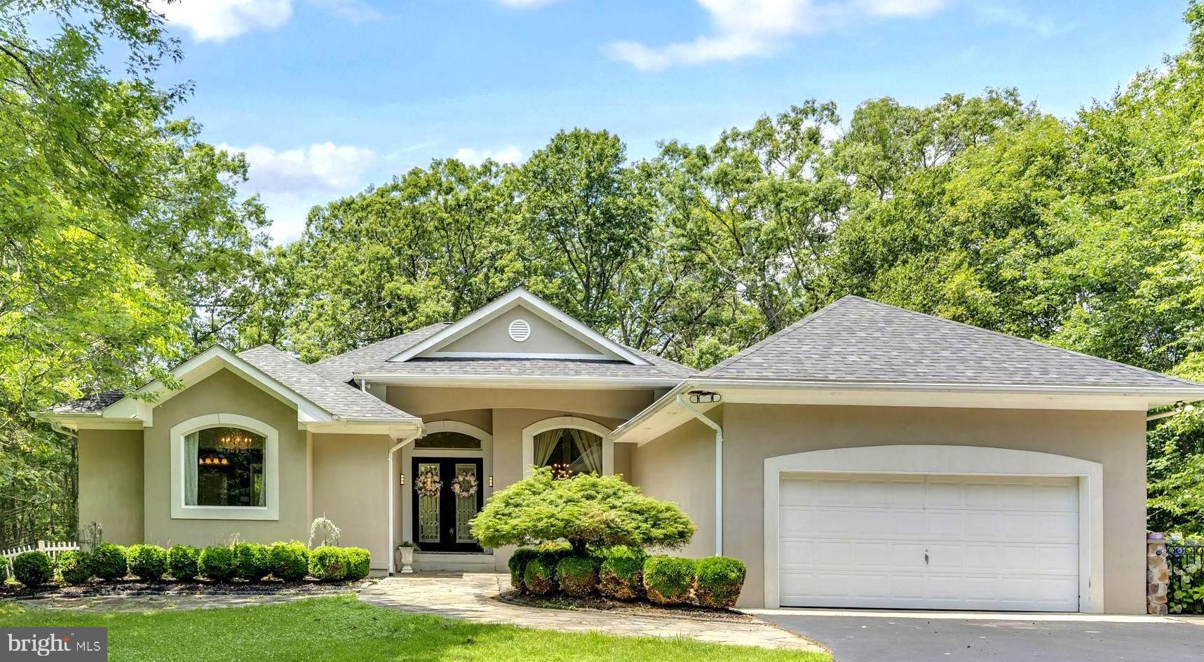 MAJOR PRICE IMPROVEMENT!
Welcome home to your own personal oasis at 22909 Kimberly Court! Driving down your long, winding, fully paved driveway, ending in a loop, you'll notice an extra parking pad for your boat or RV, a two car attached garage, a detached 3-car garage, and tons of parking! Inside the detached garage is a car lift, wall-mounted industrial fans, a window ac unit, and multiple storage and shelving units, all of which convey!
Step inside the home through the beautiful frosted glass front doors to find a thoughtfully designed custom build with a multitude of upgrades including an oversized primary bedroom and private ensuite with separate shower, soaking tub, and walk-in closet; gourmet kitchen with upgraded countertops and stainless appliances; two bedrooms with a shared bath; and another bedroom, separated from the rest, with another bath - perfect for guests! The laundry room, also on the main level, includes a tiled pet washing station and is located close to the garage entrance, so bringing in the muddy dogs and cleaning them up is a breeze!
In the lower level, you'll find a finished living space and game/theatre room where the pool table, wall-mounted movie screen and projector all convey! The remainder of the lower level is ready for your creativity with a bath rough-in already in place.
This home exudes elegance, from the wide open, airy spaces and vaulted ceilings, to the finishing touches of upgraded ceiling fans and light fixtures, beautiful flooring, and large doors and windows to let in an abundance of natural light! There are also Philips Hue smart bulbs throughout the home, with a hub that connects and controls your lighting.
And all on about 5 acres of private, wooded land with a partially fenced back yard!
This one is a must see! Schedule your tour today!