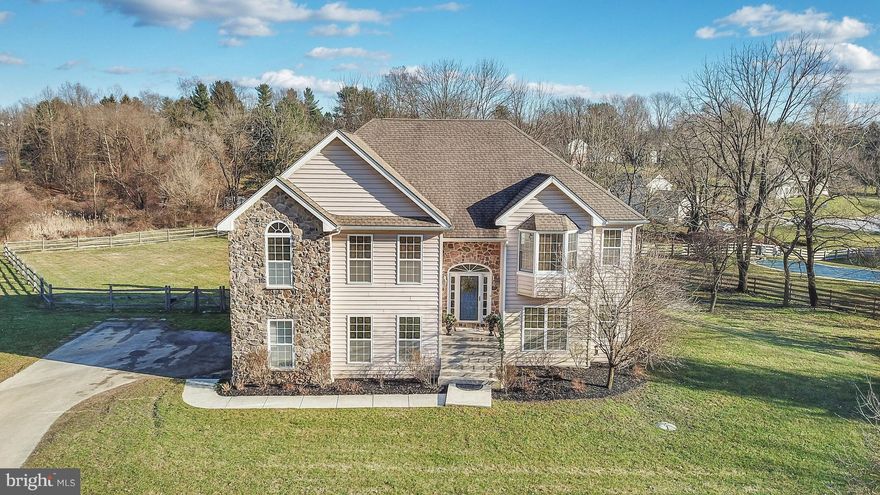 *** SELLER PLANS TO MOVE OUT IN SPRING AND WANTS A DEAL SOON. PRICE REDUCED FOR SALE NOW. DO NOT MISS OUT *** Great opportunity to own a home in West Chester, This bi-level colonial layout offers excellent options, 5 bedroom home on 2 plus acres land with absolute privacy AND convenient access to downtown West Chester for great shopping, restaurants and highways, all with maintenance free Vinyl Siding & Stone. The lower level has a great separate living area/in-law suite that offers its own private entrances. This completely independent and functional area is perfect for multi-family set up and/or a source of income from renting in beautiful West Goshen township. The up level has sun filled living areas with soaring ceilings and gas fireplace. Formal dining room with custom built bay windows. Full kitchen with Maple cabinets, stainless steel appliances and granite counters. Breakfast room with slider to the rear deck and main floor laundry. 3 main bedrooms, Master bedroom with sitting area and master bathroom with large walk-in closet. 2 additional bedrooms share hall bathroom. All main area with hardwood floors. The lower level has 2 separate living areas with 2 bedrooms, a full kitchen, full bathroom and separate family rooms both with individual outside access, great for teenagers, in-law suite, multi-family living. Spacious storage area can be converted into a 2 car garage. Plenty of land for any future additions to suit any needs. This home is very private, surrounded by trees and solitude. Rear yard is fenced! Access is private, all public utilities and great Blue Ribbon West Chester Schools! Low Taxes. A must see, call for showing today!