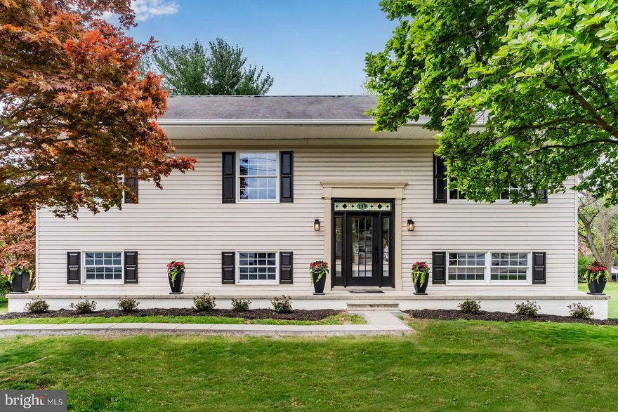 Welcome to 119 Chester Rd, a move-in ready home in East Pennsboro Township offering updated finishes, flexible living space, and everyday comfort. A custom stained-glass transom above the front French door creates a charming first impression. Inside, the home was freshly painted in 2025 and features new luxury vinyl plank flooring and carpet for style and durability. The spacious kitchen offers oak wood cabinetry, stainless steel appliances, a Bosch dishwasher, built-in desk area, and a window overlooking the backyard. The adjoining dining room opens through French doors to a 11x16 deck ideal for outdoor dining, grilling, or relaxing. The .34-acre lot includes mature trees and a built-in fire pit for added outdoor enjoyment. With 4 bedrooms and 2.5 baths, this home provides room to grow and flexible options for today’s lifestyles. Large windows bring in abundant natural light throughout. The finished lower level adds valuable living space with an additional bedroom, half bath, laundry area, and a versatile flex room with glass doors leading to the patio, which is perfect for guests, in-law space, home office, gym, or recreation room. An oversized two-car garage and expansive attic provide exceptional storage. Beautifully maintained and thoughtfully updated, this home offers space, functionality, and outdoor living.