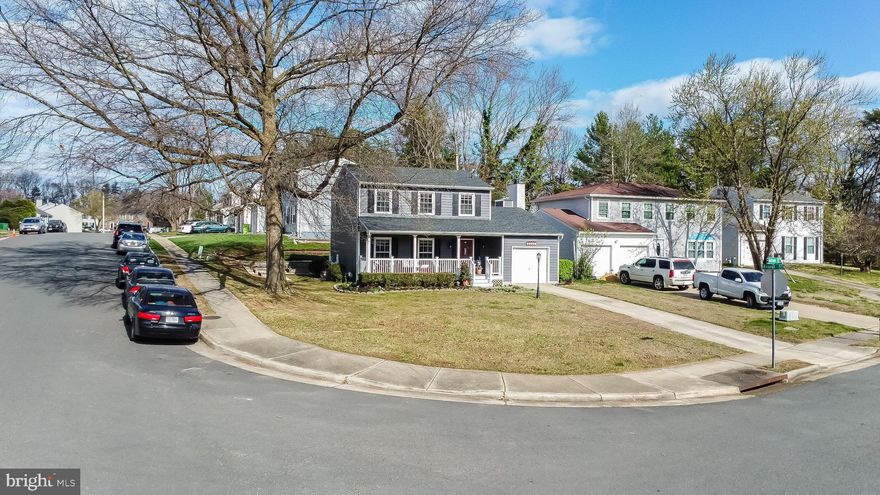 This lovely corner lot 3 bedroom, 2.5 bath, 1. car Colonial home in Woodbridge is just moments to the Fairfax County line, 95 (North and South) and 123 to Tysons. The 3-level home has had many updates over the past couple years and presents an opportunity for the new owners to add their individual touch to the lower level. The exterior siding, roof, kitchen, bathrooms, retaining wall, deck, pergola, front porch rails, columns and so much more have been updated to reflect a modern decor and provide years of worry-free maintenance. The home is situated in a location close to shopping, outdoor recreation, and is a direct commute to Ft. Belvoir, the Pentagon, Quantico and other key military installations.