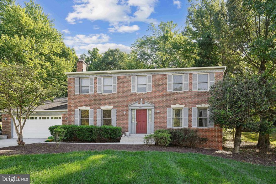 OFFERS DUE TUESDAY at NOON. Nestled in a peaceful cul-de-sac just minutes from University of Maryland - College Park and easy access to I-495, this stately brick colonial home is waiting for its next owners to make it their own. Situated on nearly half an acre—one of the largest lots on the street—the property offers a serene, wooded setting.

Upon entering, you’ll find a spacious and welcoming foyer that leads to both a cozy family room and a formal living room featuring a charming fireplace. The open-concept kitchen, complete with a breakfast area, provides an inviting space for daily meals, while the formal dining room is perfect for hosting special occasions. Additional highlights on the main level include a powder room, a convenient laundry room, and a large attached two-car garage.

For hobbyists, the property boasts an impressive 21'6" x 17'5" workshop with dedicated heating and air conditioning—ideal for woodworking, crafting, or even setting up a bike shop.

Upstairs, four generously sized bedrooms and two full bathrooms offer ample space for family and guests. The primary suite features a spacious walk-in closet, double vanity, separate shower, and a soaking tub for a relaxing retreat.

The fully finished basement adds even more living space, including a versatile recreation room, a dedicated home theater, a large storage room, and an additional full bath.

While the home requires some cosmetic updates, such as new carpeting and fresh paint, it’s priced to reflect its potential. With a new furnace installed in 2019 and fully operational bathrooms and kitchen, the home is entirely livable. The outdoor AC system does need replacement. Home is sold as-is.

Don’t miss this rare opportunity to own a home in a highly desirable neighborhood at a fantastic value!