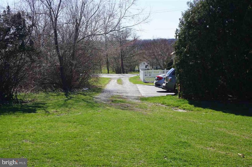 Beautiful 3.6 Acre Lot Zoned Village Center just out side of Mount Wolf. The lot is level, clear, and has many possible uses. This lot has not been for sale for over 50 years!  The property is located back off of the main road.