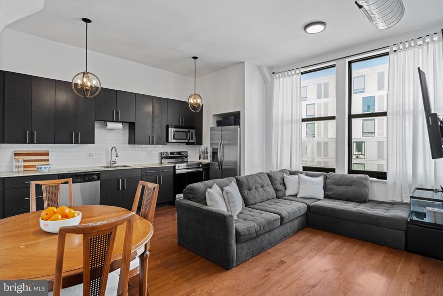 Say hello to Unit 601B at Marine Club, a contemporary, spacious one-bedroom condo offering 665 square feet of bright, functional living space, including one car-deeded garage parking!

An oversized foyer welcomes you in, outfitted with a spacious coat closet, a shoe storage rack, and a bonus work-from-home office corner with room to spare. The open-concept living area features oversized windows that flood the unit with natural light. The kitchen offers ample cabinetry, granite countertops, newer stainless steel appliances, and plenty of counter space for cooking and entertaining, including a comfortable dining area.

The bright and airy bedroom is fully carpeted with a deep walk-in closet, offering excellent storage options. The spa-like bathroom is sleek and modern, with an oversized walk-in shower.

Marine Club offers a range of community amenities to enhance the living experience. Residents can enjoy a 24/7 front desk, a large onsite fitness center, and a central courtyard with a koi pond, seasonal lounge area, and dog play area. The building’s reasonable fees and taxes make it an attractive option for those seeking convenience and access to various amenities.

Marine Club’s location is a major draw. Grocery stores, retail shops, and public transit options are all within a short walk, making it easy for residents to get around. The building is also close to Center City and many popular South Philly neighborhoods, including Graduate Hospital, Newbold, Bella Vista, Passyunk Square, and East Passyunk.