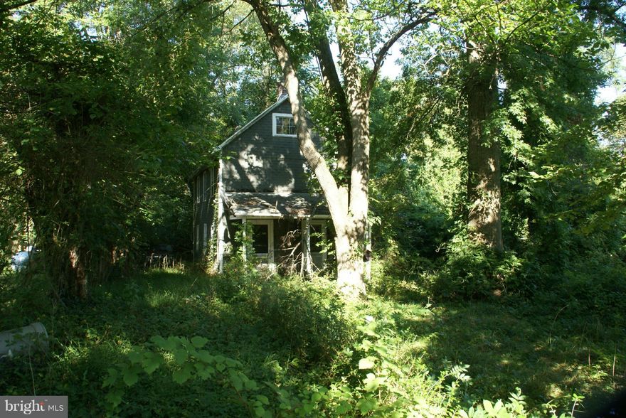 .82 Acres in St Louis with public sewer and private well! Two Story House in poor condition.