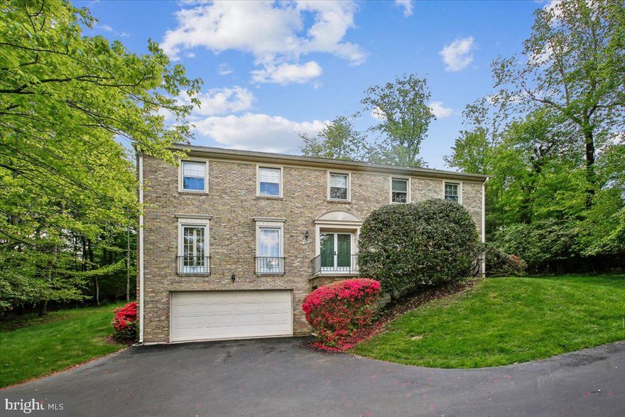 OPEN SUNDAY MAY 31, 1-3 PM!
Every surface sparkles in this large 5BR 4.5 BA MITCHELL & BEST quality home, boasting a classically designed 3,366 sq ft of fine living above grade, over 5,000 finished sq ft in total, 5 BR and 3 BA plus laundry on the upper level alone, plus a 4th full bath in the walk-out lower level. This elevated Colonial is ideally situated in Potomac on a quiet private driveway just minutes to Potomac Village, Potomac Library and everything in the award-winning Winston Churchill HS cluster.

Perched high above neighboring homes, this exceptional residence enjoys a commanding hilltop setting on a serene 0.5-acre lot, offering both privacy and sweeping treetop vistas. Rarely available, 9208 Fall River Ln. impresses with signature architectural features such as elegant French balconies across the front elevation, accenting the home office, powder room, and living room, as well as recent improvements including new roof (2021).

A gracious open living and dining space is enhanced by fresh paint, newly refinished hardwood floors, and lush green vistas from every window. Step inside to find a spacious living room accented with French balconies (four total throughout the front of the home) and formal dining room on the left, a powder room and an elegant study/office towards the front. A cozy family room in the back with a stone hearth and fireplace and double doors that open to the paved patio and beautifully landscaped backyard. The completely remodeled eat-in kitchen boasts updated countertops, SS appliances, electric cooktop, front door, refrigerator, microwave over the oven, and plenty of pantry space.

Upstairs, you’ll find all refinished hardwood floors, five spacious bedrooms and three full baths. The owner's suite features two walk-in closets, dual exposures of windows, and a bathroom with a separate water closet and walk up to a decadent soaking bathtub and dual vanities. Bedrooms 2, 3, 4, and 5 share two hallway bathrooms, and an upstairs laundry room offers the ultimate convenience for today’s modern buyer.  

The fabulous basement is an entertainer's haven ready to host with its own wet bar, open recreation space, built in shelving, beautiful wood paneling, and another full bathroom. SO many uses for this versatile space, all with its own rarely available separate entrance. Basement also offers access to the front-loading two car garage and a utility room.  A great opportunity to own in beautiful Pine Knolls, this home combines an estate-like setting with exceptional convenience, just moments to all the walking trails, community parks, playgrounds, shopping, major commuter routes I- 270/495 and more!