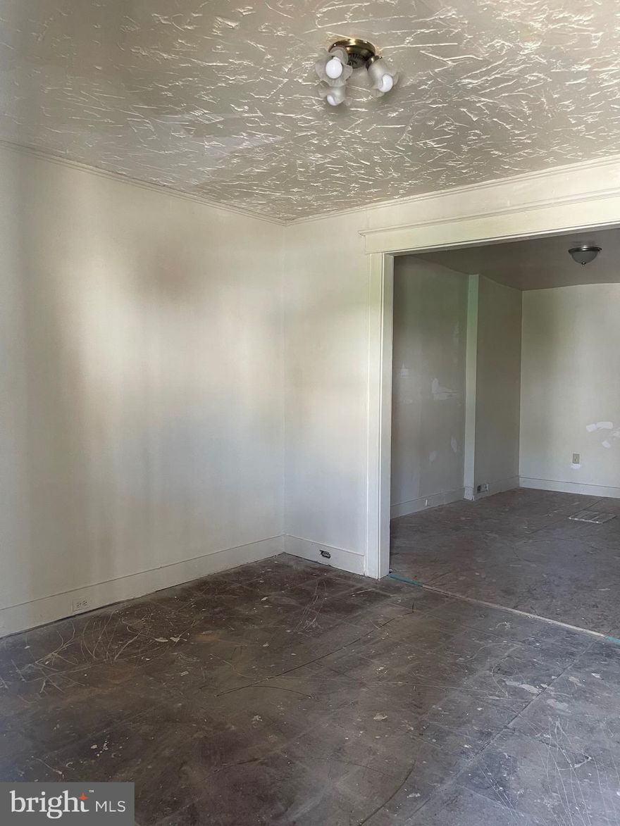 This house is the perfect opportunity for an investor looking to customize and capitalize!  This three-bedroom, one-bathroom house -- less than 10 minutes from the Johns Hopkins Campus -- is ready someone to step in and put their own touch on it.  The first floor features drywall and subfloors both primed and ready for the upgrades of your choice.  The bedrooms have flooring.   The demoed kitchen and bathroom (with a skylight!) are the prefect blank slate.   Whether you're planning a flip or a long-term rental, this property is an opportunity to add quickly value.