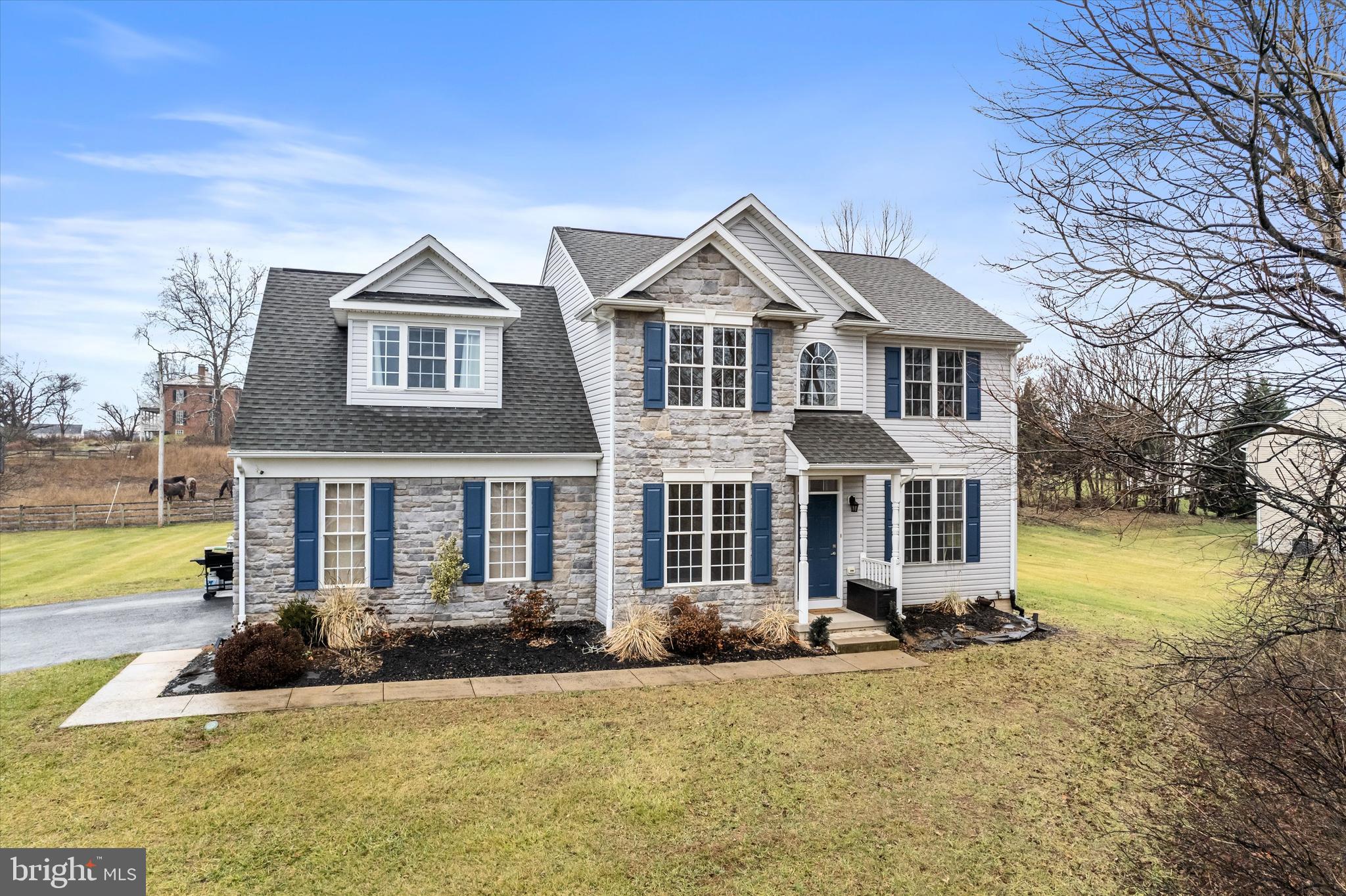 Discover the charm of suburban living in this spacious 4-bedroom, 2.5-bathroom house nestled in scenic Falling Waters, West Virginia. Boasting 2,316 square feet of interior living space, this property offers ample room for family activities and individual relaxation. Step inside to find a welcoming atmosphere highlighted on the main floor by the updated kitchen, living room with gas fireplace and an office and upstairs by the generous sized owner’s suite, perfect for unwinding after a busy day. This suite features a vaulted ceiling, walk-in closet and ensuite bathroom. Outside, the true allure of this home is evident. Positioned on just shy of an acre lot backing to a small, serene farm, the outdoor space invites peaceful mornings and enjoyable evenings by the firepit in a picturesque setting. Whether you're up for a day of gardening or simply savoring a cup of coffee, the possibilities are endless. Residents benefit greatly from the proximity to top-notch local amenities. Spring Mills High School ensures educational excellence just a short drive away, while essential shopping can be done conveniently at nearby grocery stores. For leisure, the nearby historic C&O Canal Dam #5 offers beautiful parkland, perfect for weekend outings. In a neighborhood that strikes the perfect balance between tranquility and accessibility, this house is poised to be your next dream home. Embrace a lifestyle where comfort meets convenience in this delightful community.