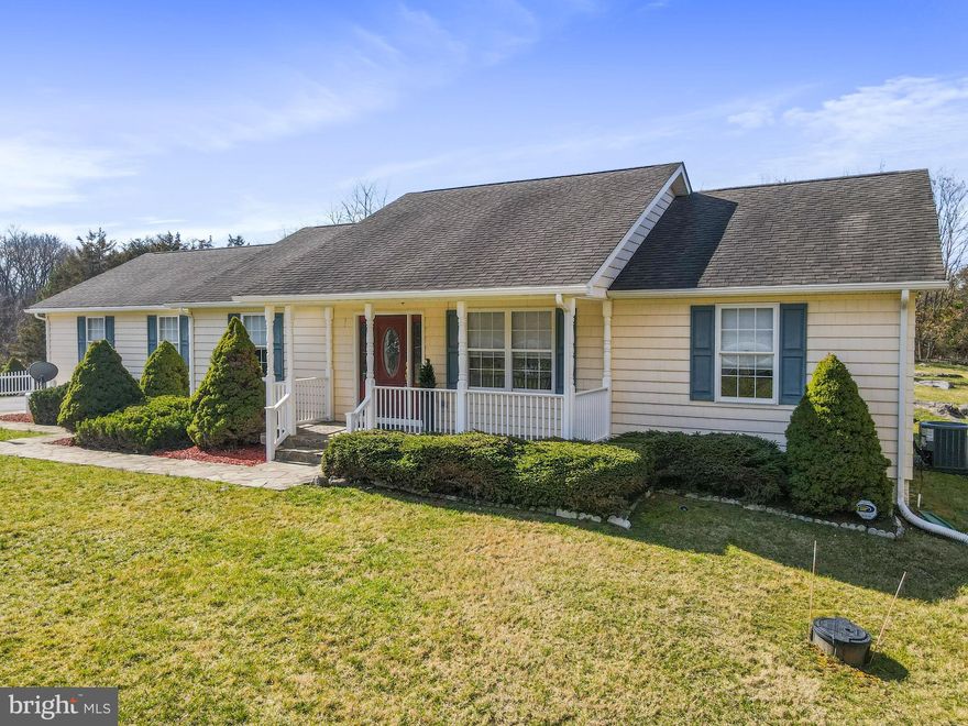 Welcome to your new haven at 129 Morgan Grove Road, a meticulously designed home that harmonizes sophistication with tranquility. Nestled on an expansive 2-acres with NO HOA in sought after Shepherdstown, WV.  The serene setting complemented by its convenience to local parks, shopping, dining, and entertainment options, offers the perfect blend of peaceful living and accessibility. This charming home features three generously sized bedrooms and two full bathrooms. The heart of the home is adorned with hardwood flooring and a cozy gas fireplace, creating a warm atmosphere for gatherings. The open floor concept seamlessly connects the living spaces which are highlighted by a sunroom that brings in an abundance of natural light, and a screened porch that invites you to relax, unwind and enjoy the tranquil outdoors. The kitchen is a chef's delight, equipped with granite countertops, oak cabinetry, and modern appliances. Adjacent to the kitchen, the mudroom includes a utility sink and cabinetry, adding practicality to elegance. The oversized 24x26 garage with epoxy flooring, high ceiling and built in storage offers ample storage and workspace, and is equipped with a 30 amp breaker. Attention to detail is evident throughout this beautiful home, from crown molding and vaulted ceilings to a whole-home generator and tankless water heater. Recently refreshed with full interior paint to include ceiling, doors, trim, crown molding and walls. This home is ready to welcome its new owners. Don't miss your chance to discover the perfect balance of luxury, comfort and convenience with tranquility,  privacy and NO HOA at 129 Morgan Grove Road, Shepherdstown, WV.