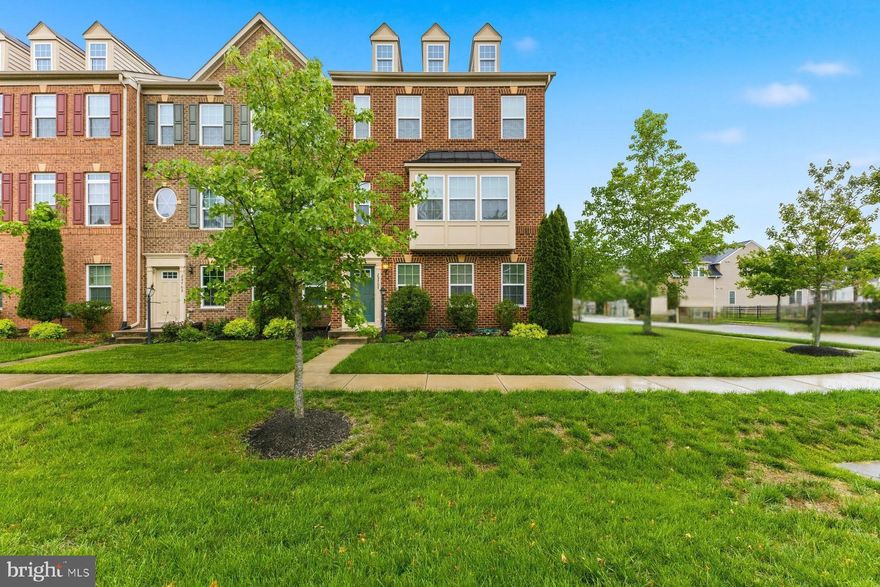 Welcome home to this spacious end-of-group townhome offering three finished levels of comfortable living space and an open, versatile layout. Enter through the attached garage or front entrance to the bright lower-level family room-the perfect space for entertaining, a home office, playroom, or additional living area. The main level features an inviting open-concept design with a spacious living area, dining space, and modern kitchen complete with a center island, stylish cabinetry, and stainless steel appliances. Just off the kitchen and dining area, enjoy an additional sun-filled family room surrounded by windows with direct access to the large rear deck-ideal for relaxing or hosting guests. The 3rd level boats the expansive primary suite that offers a private sitting area along with an ensuite bath featuring a soaking tub and separate shower. Two additional bedrooms and a full bath complete the upper level. Enjoy community amenities including a tot lot, community center, and tennis courts, all conveniently located near shopping, dining, and commuter routes.