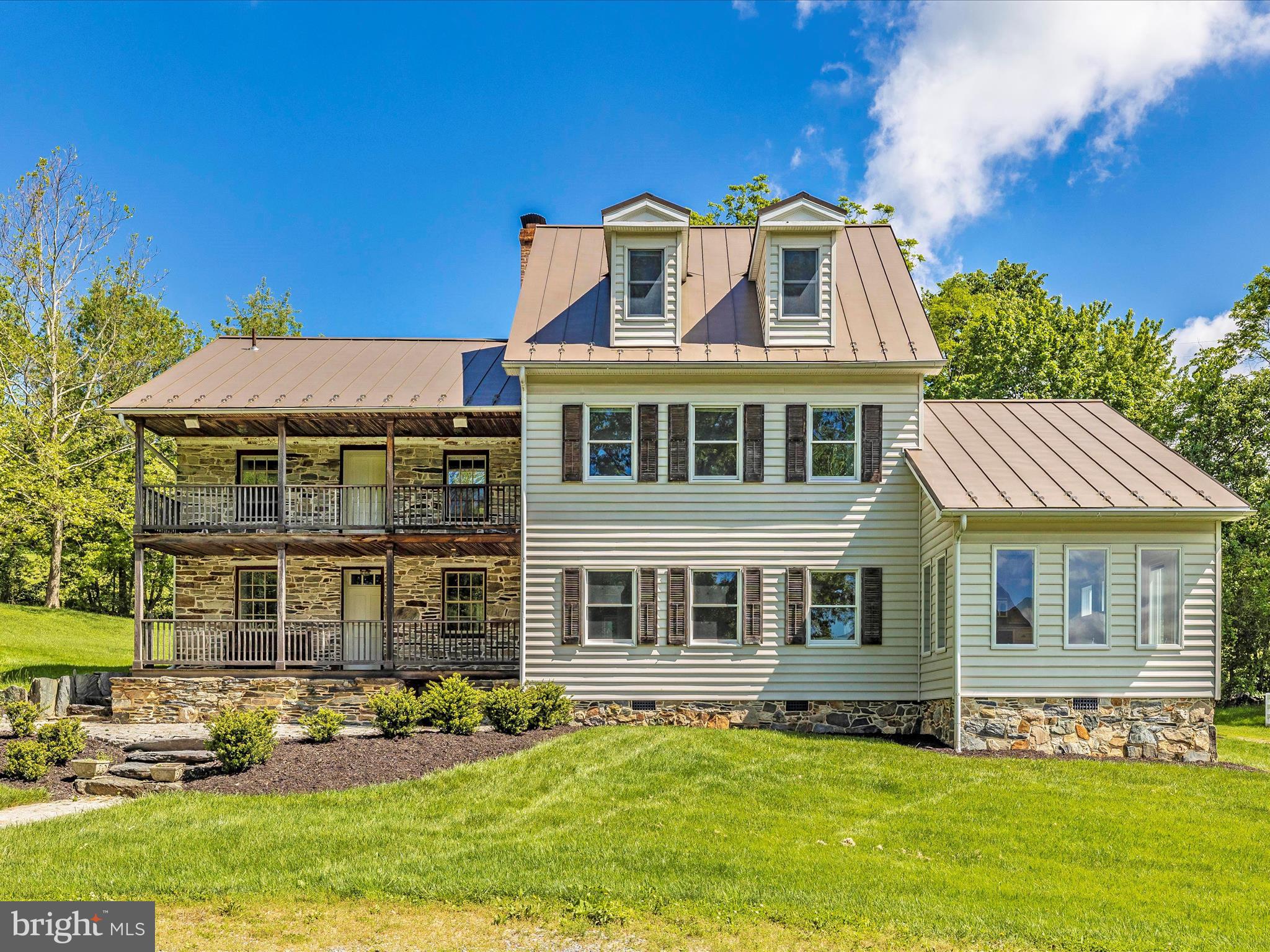 Charming Historic Farm Property on 35 Acres - 4922 Shookstown Road
Discover the charm and history of this stunning 35-acre farm property located at 4922 Shookstown Road. This unique estate features a beautifully built residential house, a large barn, and a smaller storage barn, providing ample space for all your farming and storage needs.
Main Residence:
The main house is a masterpiece of design, offering a blend of historical elegance and modern comforts. The first level welcomes you with a front study/library, perfect for a home office or reading nook. The living and dining rooms flow seamlessly into a beautifully lit kitchen, making it ideal for family gatherings and entertaining. Additional features include a half bathroom, a convenient laundry area, and a mudroom.
Second Floor:
The second floor is designed for comfort and luxury, featuring two full bathrooms, including a master bath with his-and-hers sinks, a bathtub, and a separate shower. Five spacious bedrooms provide plenty of room for family and guests, and a loft area offers additional living or play space.
Top Floor:
The top floor boasts a charming attic/loft space, perfect for a cozy reading corner or a creative play area for children.
Property Features:
Expansive 35 acres
Large barn and smaller storage barn
Beautifully landscaped grounds
Ample space for animals
Scenic pond
Summer Kitchen with bath
Plenty of Storage