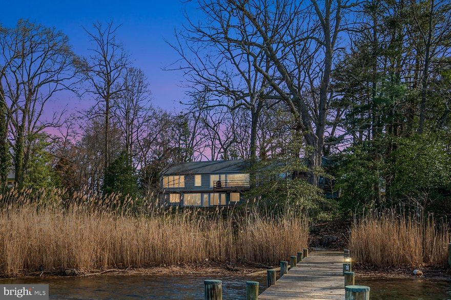 Stunning views on MillCreek! Welcome to 1910 Hidden Point Road, a 3 bedroom 3 bath home nestled on a .77 acre lot along the shores of the highly sought after neighborhood of St Margarets in Annapolis.  This handsome,  4,000 plus Sq Ft rancher, a truly an exceptional property, is being offered for sale for the first time in over 50 years. First, Step onto the expansive rear deck, stretching the length of the house, and behold the breathtaking vistas of Mill Creek. The home offers an open plan living room with unrivaled water views, a wood burning fireplace, gorgeous hardwood floors, a gourmet kitchen and an open dining space. In addition, an entirely separate family room with a second primary main floor bedroom offers a unique multigenerational feature. This side of the home is equipped with a kitchenette and separate entrance. A screened porch facing the water offers a perfect way to start the day with a coffee or respite at the end of the day with a libation. The lower level of this remarkable abode
has a partially finished basement (966 sq ft finished of the 2037 sq ft) with outdoor access, windows, large office space, living area and an extra room that can be converted to a bedroom or exercise room.

Venture down to the private pier, boasting aprox 6-8" MLW, where the tranquil waters of Mill Creek await. The pier is situated on aprox 100 feet of private shoreline, completing this Annapolis waterfront estate. Mill Creek quickly opens to the Chesapeake Bay, providing easy access to the Severn River, and Downtown Annapolis, giving you the Annapolis boating lifestyle you’re after. 

 Renovate and make this your waterfront dream home!