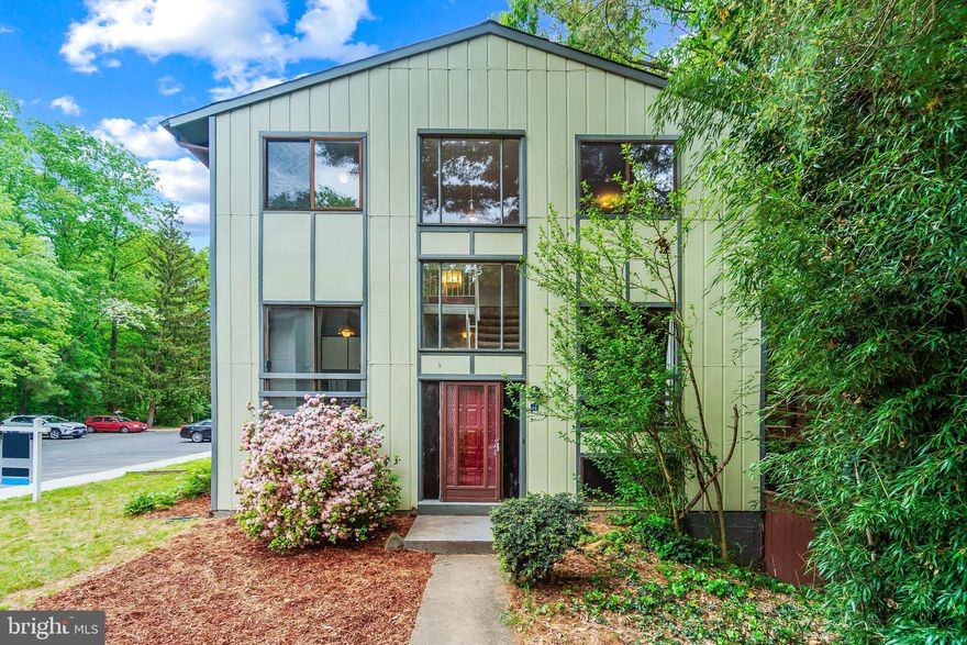 Location Location Location!! This amazing end unit town house with a wall of windows and backing to trees makes this such a great opportunity! Located just off of Reston Parkway you are just minutes from Reston Town Center and will be even closer to the amazing new Haley Rise Development that will have shops, restaurants, and beautiful public parks! You are also just minutes from the Reston Parkway Metro Station! This townhouse has 3 bedrooms upstairs with 2 full baths and 2 half-baths, one on the main and one in the basement. The foyer is light filled two story foyer with a contemporary stair case and a wall of windows that just fill the house with light. As you enter the house you enter a split level so in just a few steps you can go up to the main level or down to the basement. On the main level you have the kitchen, dinning, half bath, and living room. In the basement you have a place for a home gym or home office or children's play area as well as a half bath, laundry room and large rec room with walk out to the private back yard! The upper level has the bedrooms and 2 full bathrooms. This townhouse comes with 2 assigned parking spaces and lots of room for guests to park! There is also a play ground near by as well as one of Reston Associations Pools! This is a great time to buy in this area before the metro opens and Haley Rise is completed!! Wegmans is slated to open in 2022 in Haley Rise!