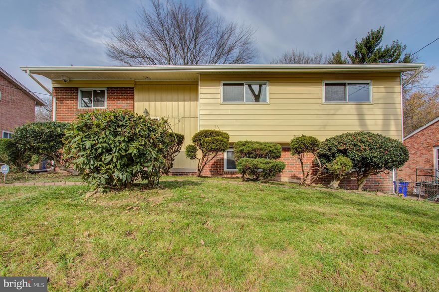 Celebrate the holidays and New Year in this beautiful house. You will definitely fall in love. The upper floor has three generous sized bedrooms, two renovated bathrooms, splendid Kitchen with granite counter top and stainless steel appliances. Lower level has one bedroom, extra room, large family room, bathroom, and kitchenette. New heating and air conditioning, new electric panel box, refinished hardwood floors on all upper floor and beautiful laminate floor in basement. Commuters dream, in public bus route, inside belt way, and close to major roads. Won't last long!