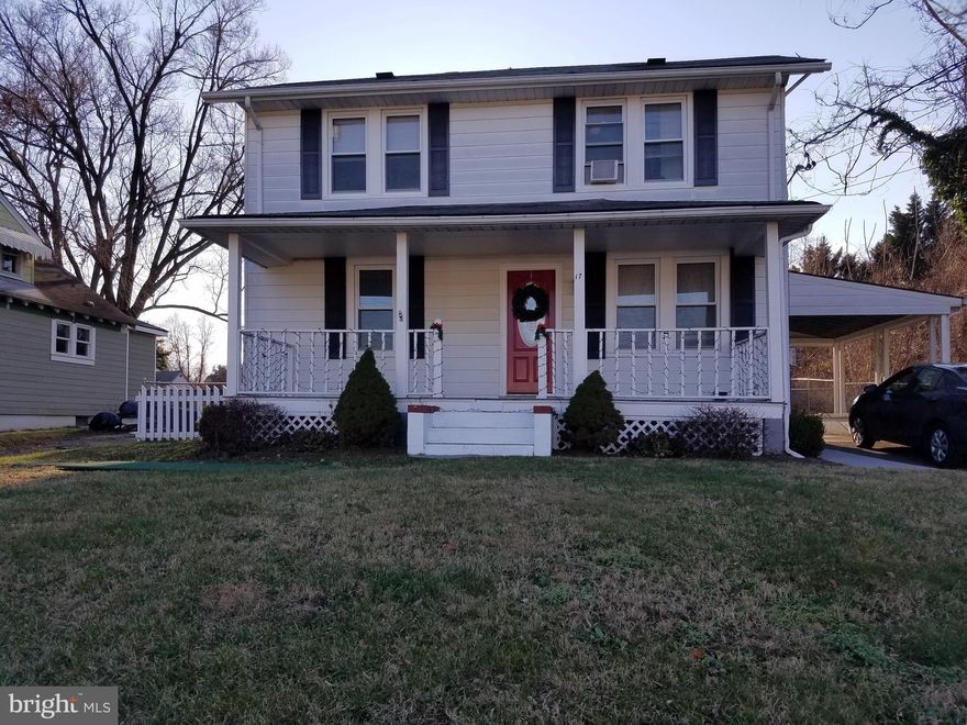 This sunny 2nd floor apartment of two family home, has separate entrance, hardwood floors, 1 or 2 bedrooms (could use one for den/ofc), 1 full bath, front load washer/dryer.   Carport and driveway parking shared with tenant on first floor.  Convenient location to Bestgate, downtown, stadium and Routes 50 and 97.  RENT INCLUDES LAWN AND ALL UTILITIES WITH EXCEPTION OF CABLE AND PHONE!! Pets case/case; non smoking unit. 12/01 availability, possibly sooner.   Tenant in process of moving; 24 hours notice to show 11/14-11/21; showings thru Bright MLS.