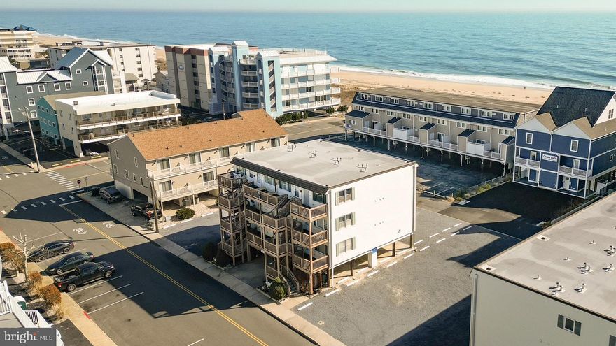 South corner  end unit  with lots of natural light * Ocean Block  * 1 Bedroom with views of the ocean  *  Large open deck * Newly renovated with all new kitchen appliances, Central HVAC , Washer/dryer, freshly painted ready for you to occupy. or use an an income producing property. Extremely Spacious and Look At This Location-convenient to restaurants, shops, ice cream, mini golf, busline, of course the beach * Vacation is one of the best locations in town *