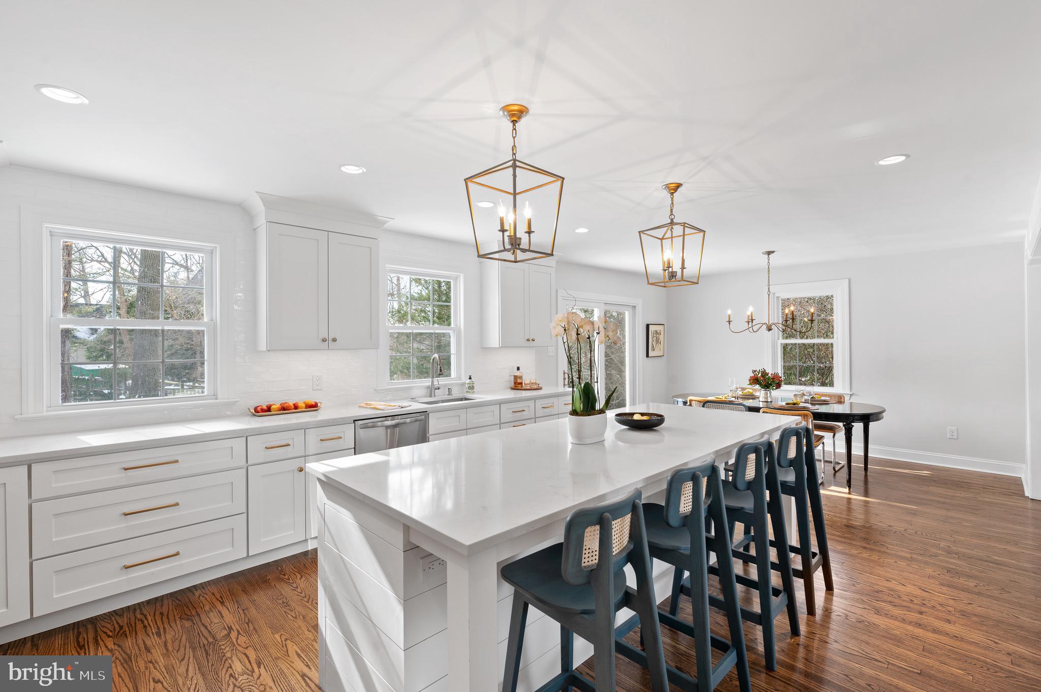 Stunning, renovated, 5-bedroom, Radnor Township home, with 3 full baths, a powder room, and 2 car garage. This completely updated, move-in ready house sits in the very center of Philadelphia’s Main Line. Located in Villanova, this ultra-convenient location is sure to please, close to Starbucks, restaurants and the train. This home sits within a wonderful and very welcoming, walkable neighborhood, located in the coveted Radnor Elementary School district.
This 5 bedroom home has been fully remodeled and professionally designed with so much style, you won’t have to do a thing. Renovations include entirely new floor with 2 bedrooms, full bath and big walk in storage closet. The brand new area totals an additional 520 square feet of living space, which also has its own newly installed HVAC zone, to ensure comfort for all the seasons. All of the bathrooms are newly updated (3 full and one powder room), and a new chef's kitchen with white shaker style cabinets, quartz countertops and a subway tile backsplash along with new stainless steel appliances, a built-in microwave drawer and under-counter beverage fridge. The minute you walk in the front door, you will be awed by the fresh and current finishes, including oversized moldings, beautiful wainscotting and stunning hardwood floors. Enter the foyer and to your left is a coat closet, and to the right is a large family room with a wood burning fireplace. The hub of the home is the new gourmet kitchen with a 9+ foot island that comfortably seats five. The open dining area has a gorgeous view out onto the brand new deck, covered porch and private back yard. Downstairs is the second family room, and off of the lower level family room is the powder room, storage closet and the well-appointed laundry and mudroom, with 3 oversized cubbies, lots of hooks and large space below for shoes, mittens, etc. Strategically placed, the mudroom allows easy access to the garage or the driveway.
Upstairs the Main bedroom suite has it all! A large walk-in closet and a second closet with custom shelving, as well as a brand new bathroom with a walk-in shower, double vanity with a quartz countertop and porcelain tile floor. This level also has two more generously sized bedrooms and a beautiful hall bath. Large and spacious, this hall bath has double sinks with all new fixtures and a bathtub. Outside of this bath, you will find an oversized linen closet as well as another hall closet. Next level up is the all brand new finished space. On the right at the top of the stairs is a very convenient and spacious storage area, on the left, a full bath with double sink vanity and walk in shower with a rain showerhead. There are also 2 additional bedrooms with loads of privacy and scenic views.
If you are looking for a centrally located, beautifully renovated home in Villanova with Radnor Schools, it doesn’t get much better than this. Enjoy entertaining friends and family in the open, easy floor plan, or outside on the covered patio or brand new deck. Enjoy the annual neighborhood block parties, holiday cookie exchange, book club, gourmet themed dinners, take a quick ride to dinner at La Scala or jog through the pathways of Villanova University while enjoying the endless conveniences of this location and exquisitely designed home.