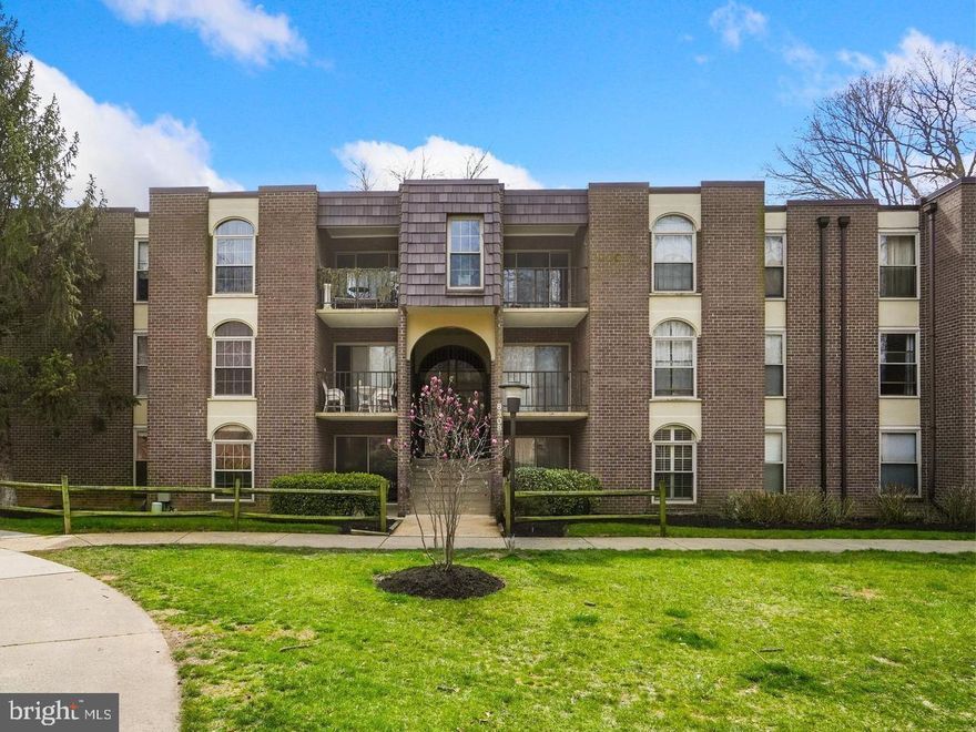 Don't miss this spacious 2-bedroom, 1.5 bath condo in Woodburn Village with fantastic courtyard views from the patio. You will love relaxing in the shade. Bright open floor plan with hardwood floors.   UTILITIES INCLUDED! 1 Assigned parking + additional parking stickers available. Storage Unit included. Laundry & Trash Room in building. Large master bedroom with walk n closet, breakfast area, large family room, sliding doors to patio area. Condo amenities include pool, tennis courts, walking paths, and much much more. Just move in! *** This home is vacant. Please access Sentrilock to show, Thank You!