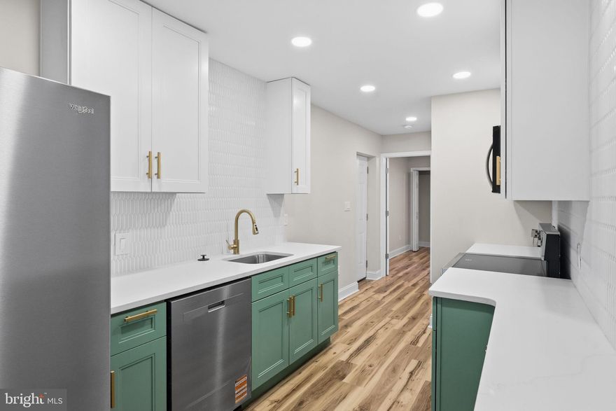 Whether you are an investor or first time home buyer, this move-in ready 4BR/3.5BA townhome features a new roof, new flooring, all-new appliances, new water heater, and new AC units. Includes a first-floor bedroom with full bath and a private fenced back yard.  This home is also located in a geographical area that may qualify for additional grants through the city of Wilmington. Talk to your local lender about your options! Don't miss out on this opportunity, schedule your private tour today!