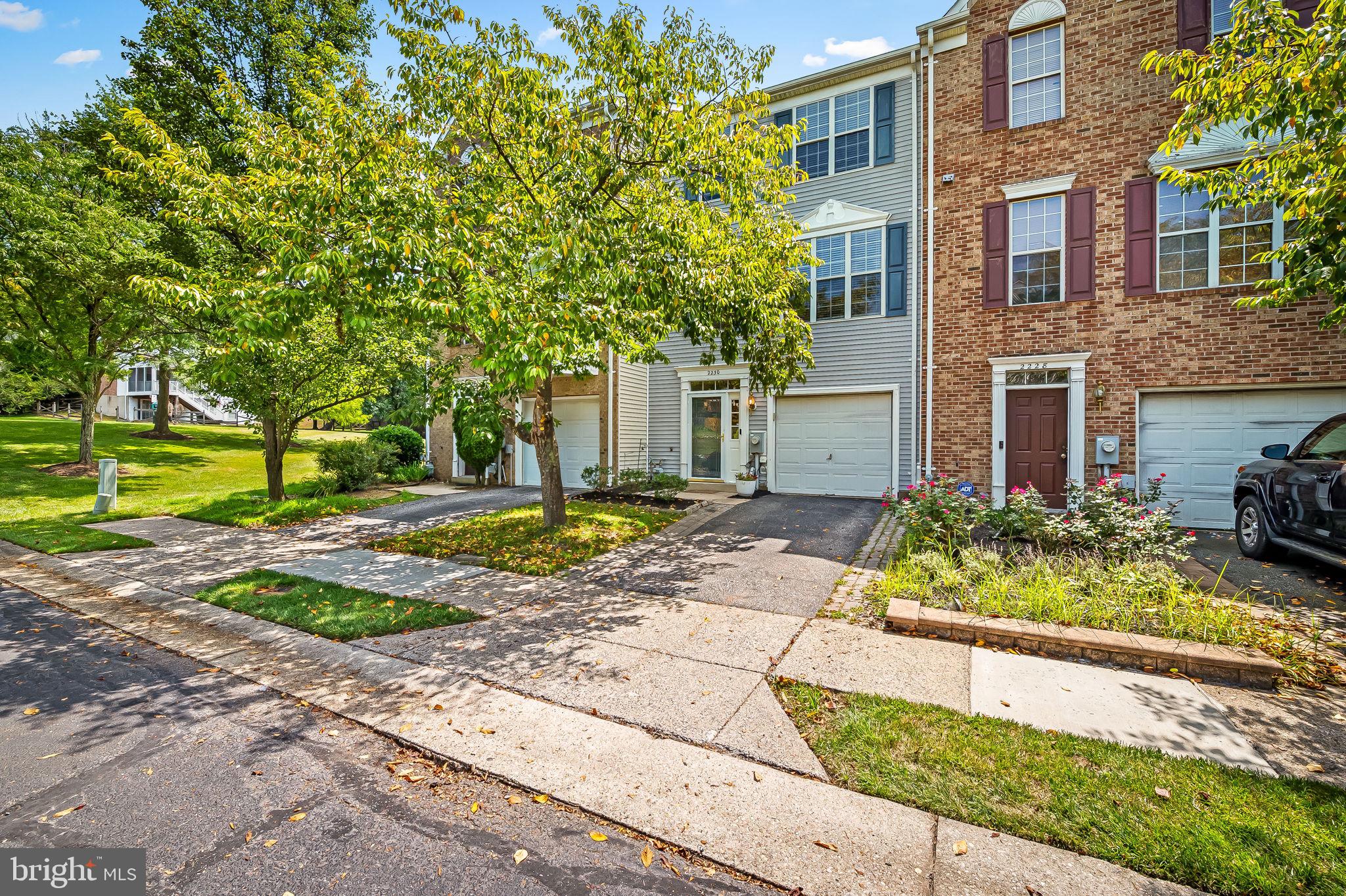 OPEN SUNDAY 1-3. This bright and spacious garage home in The Knolls of Crofton Village features 3 bedrooms, 2 full baths, and 2 half baths. The entry level features a rarely available 1 car garage, foyer, and large family room with side-by side laundry area, a half bath, and sliding doors that lead to a patio and fully-fenced rear yard.
Upstairs on the second floor you’ll love the open concept living room, dining area and large kitchen with granite countertops, stainless steel steel appliances, center island and eat in dining area. A large deck is perfect for sunny mornings and cool evenings grilling and spending time with friends and family where you can look out over the community’s walking trail and open spaces. There are luxury plank floors throughout this level.
The top level features a large primary bedroom suite with vaulted ceilings, a nice closet and functional primary bedroom with tub and shower. There are 2 more bedrooms and another full hall bath. AC replaced (2019), water heater (2017), washer/dryer (2017,) carpeting (2019), LVP flooring (2019), blinds (2018). Additional highlights: plenty of guest parking, community pool, clubhouse, tennis & tot lot/walking trails of Crofton Village. Not a thru street. A great place to call home!