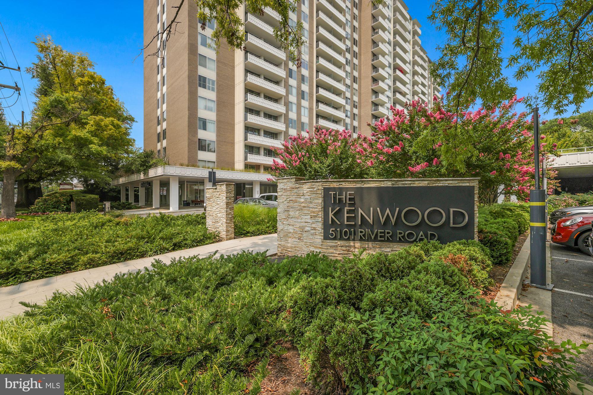Welcome to this spacious 1,360 sq ft, 2-bedroom, 2-bath condo at The Kenwood, conveniently located near downtown Bethesda and Westbard Square. This freshly painted unit boasts an open-concept living and dining area, perfect for modern living. Enjoy refinished parquet wood floors as you step out onto your balcony overlooking the promenade.
The kitchen is thoughtfully designed with granite countertops, all white appliances and an eat-in corner. The owner's suite features sleek sliding closet doors, and an ensuite bath with a new glass shower door. Just down the hall, you'll find a shared full bathroom and an additional spacious bedroom with plenty of closet space!
Separately deeded garage parking conveys with the sale. Storage space included too!
Don’t miss these other benefits of living at The Kenwood; 24-hour concierge, security systems, fitness center, outdoor pool, beautifully landscaped grounds with gas grills, walking paths and benches, and a party room. Shared laundry room on each floor. Your condo fee includes these amenities, plus all utilities and parking fees. Close to Whole Foods, Westbard Square, downtown Bethesda, Giant, shopping, restaurants, the Capital Crescent Trail and the DC border. The Metro Bus is right in front of the condo. Don't miss out on this opportunity!