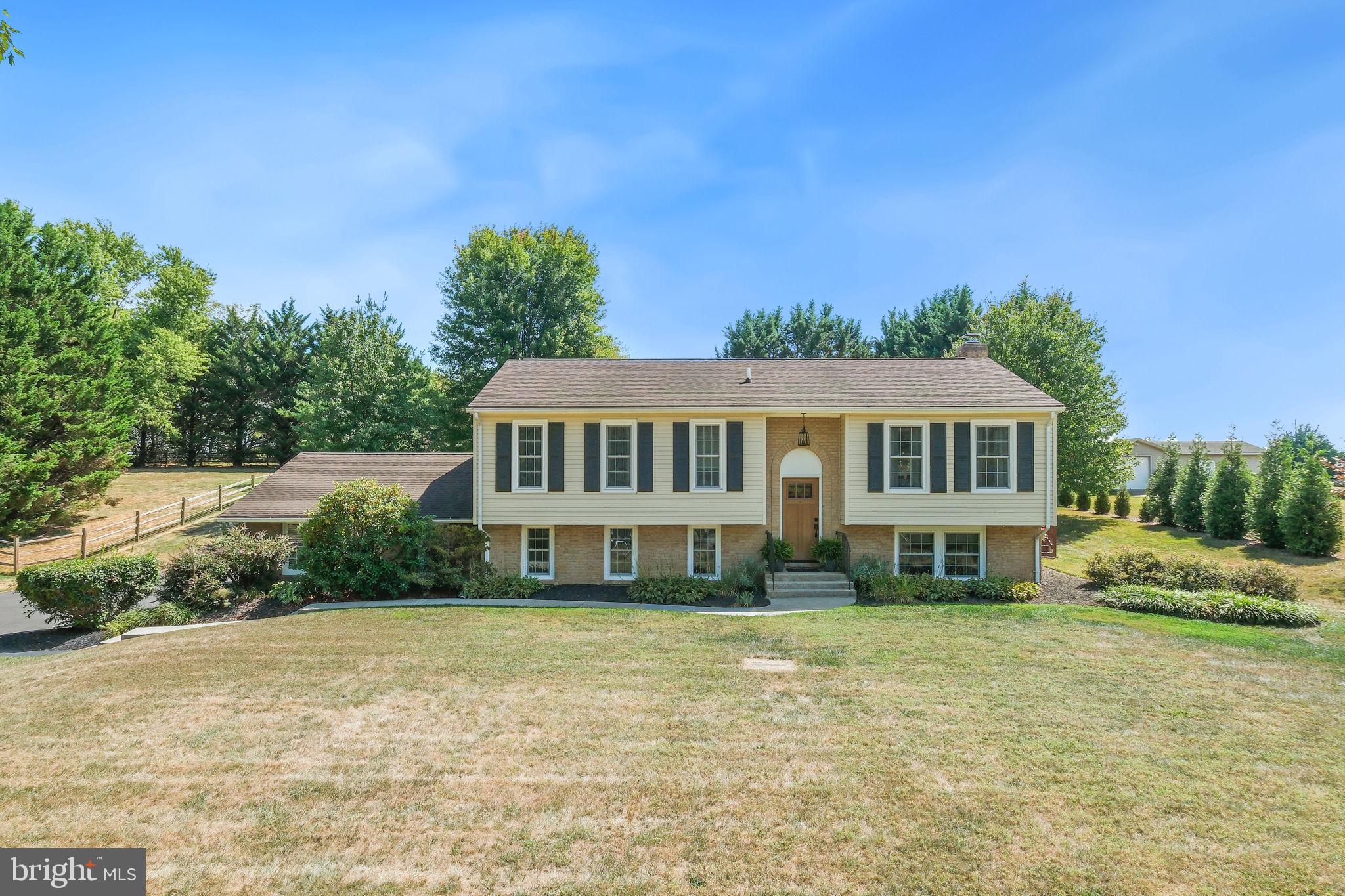 Welcome to Middletown South, where timeless charm meets modern living. This beautifully maintained split foyer home offers over 2,100 square feet of thoughtfully designed space on a sprawling 0.95-acre lot—perfect for entertaining, gardening, or simply unwinding in your own private retreat.
Inside, the warmth and elegance are immediately apparent. Crown moldings and recessed lighting elevate the traditional floor plan, where a spacious dining area sets the scene for memorable gatherings. Two lovely bedrooms and bath complete the main level. The inviting family room with fireplace on the lower level promises cozy evenings at the heart of the home. The bedroom and renovated bath complete the lower level.
The stunning kitchen shines with a new dishwasher ,double door refrigerator and stove, while both bathrooms have been stylishly updated. A new custom front door, fresh interior and exterior paint, and recent upgrades including a new HVAC system (2024), new washer/dryer, blown-in insulation, and driveway sealing ensure comfort, efficiency, and peace of mind for years to come.
This home has three generously sized bedrooms, including a tranquil primary suite with private bath.
Outdoors, the property is equally impressive: a 2-car side-entry garage, separate storage wood shed, and dedicated garden area offer space and versatility for every need. Nearly an acre of lush grounds invite you to play, entertain, or simply enjoy the serenity of nature.
This home is more than just a residence — it’s a place where modern updates and classic style come together to create the perfect backdrop for your next chapter.
Don’t miss the chance to call this Middletown South gem your new home!