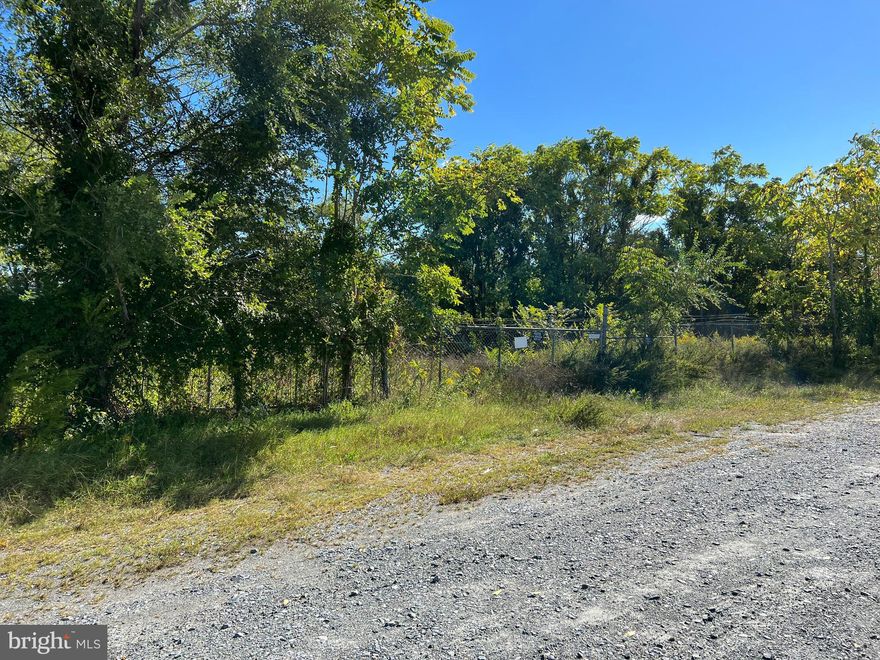 Zoned commercial parcel in Salisbury, Md. Property is completely surrounded with galvanized fencing  opening up multiple storage possibilities and business opportunities.  A very nice wide and maintained gravel drive leads to the main gate of the property allowing plenty of room to back in long length trailers.  Owner Financing Available.

Buyer's responsibility to perform due diligence regarding property use and city taxes.