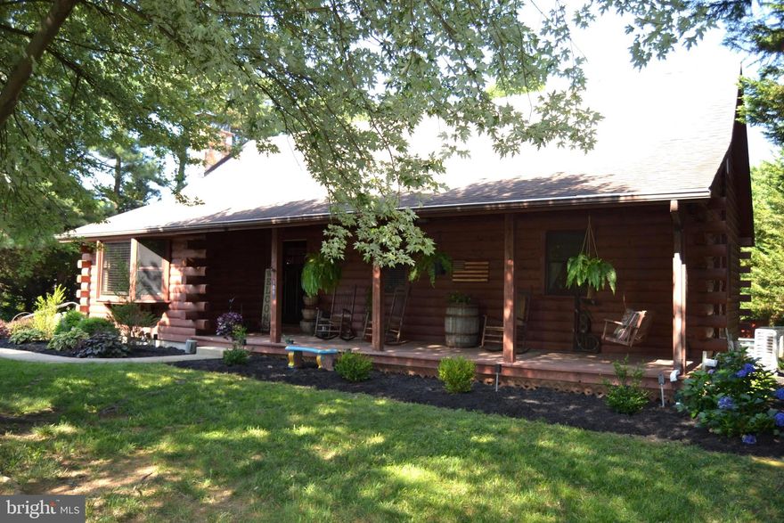 OPEN HOUSE CANCELED.  CONTRACTS RECEIVED.  
Charming Farmette on 4.7 acres with Log Home, Barn, and Abundant Amenities -- 
Nestled on a private 4.7-acre parcel this delightful farmette offers the perfect blend of rustic charm and modern comforts. Embrace the tranquility of country living while enjoying the convenience of recent updates throughout the property. With a lovingly-maintained and upgraded log home, a spacious 4-stall barn, and numerous amenities for the whole family, this property presents a rare opportunity to live the idyllic rural lifestyle. Located 15 minutes from the Fair Hill Training Center which provides tons of trail riding opportunities, it is sure to please. Step inside the charming log home and be greeted by a warm and inviting atmosphere. The heart of this residence is the newly renovated kitchen, new stainless steel appliances, granite countertops, and ample storage space. Peek out of the window above the sink and see your fully fenced back yard, and past that, the horses grazing quietly. The home's HVAC system has been recently upgraded, ensuring year-round comfort for you and your loved ones. Rest easy knowing that the roofs have also been replaced, providing additional peace of mind and durability for years to come. The walk-out basement offers a large sitting room, full bath and additional multipurpose or office space.  Equestrian enthusiasts will be delighted by the 4-stall barn equipped to accommodate horses or other farm animals in comfort and style. The barn's Electrobraid fencing offers a safe and secure environment, ensuring your four-legged friends can roam freely and happily. The property includes a spacious 2-car garage that boasts a separate workshop area for all your DIY projects. Whether you're a seasoned craftsman or an aspiring hobbyist, this workshop provides the perfect space to bring your creative visions to life. Discover the recently completed office above the garage, thoughtfully designed to provide a quiet workspace. Stay productive and focused while enjoying the convenience of the mini-split system, ensuring your comfort throughout the year. Storage needs are met with ease thanks to the below-grade storage area for mowers or other outdoor equipment. Create lasting memories with family gatherings, barbecues, and outdoor activities in this private and inviting space. Located just minutes from the towns of North East and Charlestown and the amenities of the Chesapeake Bay.  Close to Rt. 95 for access to the major cities and there is lots of shopping and entertainment close by.  Don't miss the chance to own this completely updated farmette, where timeless appeal meets modern convenience. Embrace the beauty of country living while enjoying the comfort and amenities you desire. Schedule a viewing today and make this property your very own.  FOR SAFETY REASONS PLEASE DO NOT ENTER THE BARN DURING SHOWING.  YOU CAN EASILY SEE EVERYTHING FROM THE DOORS.