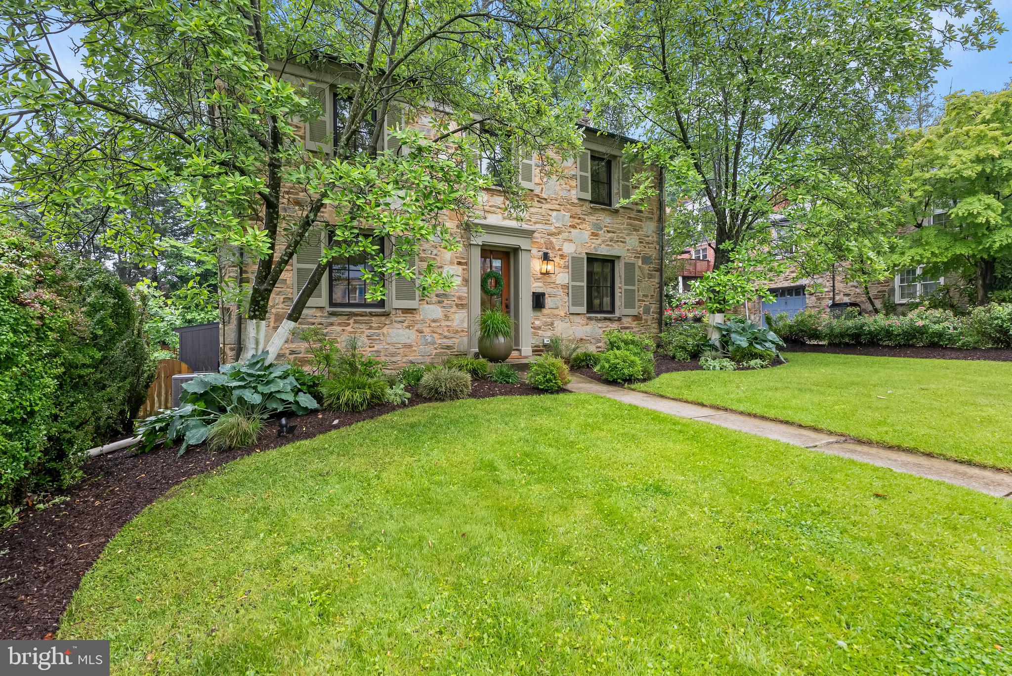 Nestled in the charming West Towson neighborhood, this exquisite Colonial home, built in 1943, showcases timeless craftsmanship and modern comforts. The exterior, adorned with classic stonework, invites you into a warm and inviting atmosphere. Step inside to discover a thoughtfully designed interior featuring rich hardwood floors that flow seamlessly throughout. The traditional floor plan enhances the home's spaciousness, while the recent gourmet kitchen, equipped with modern appliances including a dishwasher, electric oven/range, marble counters,and refrigerator, is perfect for culinary enthusiasts. The dining area is ideal for gatherings, creating a cozy space for shared meals and memories. Relax in the living room, where a stunning stone fireplace serves as a focal point, radiating warmth and charm. The home boasts three comfortable bedrooms and one and a half well-appointed remodeled bathrooms, ensuring ample space for relaxation and privacy. Walk up floored attic for ample storage.The finished basement with new carpet offers additional versatility, whether for storage or a creative retreat. Outside, extensive hardscaping ,stone patio and sidewalks create an inviting outdoor space, perfect for enjoying the fresh air. With recent double-pane casement windows allowing natural light to flood in, this home is a perfect blend of classic elegance and modern living. Recent shed to protect your toys. Experience the comfort and character of this exceptional property, where every detail has been lovingly maintained.