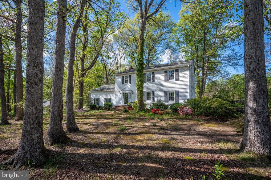 WELCOME HOME to 4015 Duke of Gloucester.  Talk about this location and in the sought after lovely and quiet neighborhood of Heatherstone.  Take advantage of this fantastic opportunity to live close to the lovely Downtown Fredericksburg, Fred Nats stadium, restaurants, grocery stores, shopping and less than 2 miles from I95.     Heatherstone is known for its charm, character and wooded lots,.  4015 is a 2 story Colonial, 4 bedroom, 2.5 bath and sits in half acre lot. As you approach the home you enter into a freshly painted front door and foyer with a 1/2 bath to the left.   As you walk down the hall you approach a family room/sitting area that opens up into the kitchen.  Imagine enjoying your morning coffee at this cozy fireplace.   The kitchen features stainless appliances. The range/oven and dishwasher were newly purchased in 2021. The refrigerator and microwave were newly purchased in 2024.  Off the kitchen is a separate dining room with beautiful antique wood french doors opening to a large living room. The approximately 100-year-old doors are from a Culpeper Church. As you walk upstairs, you will find four nice-sized bedrooms and two full bathrooms.  The fenced backyard has a fire pit, deck and backs up to a large pasture.  You don't want to miss this home.