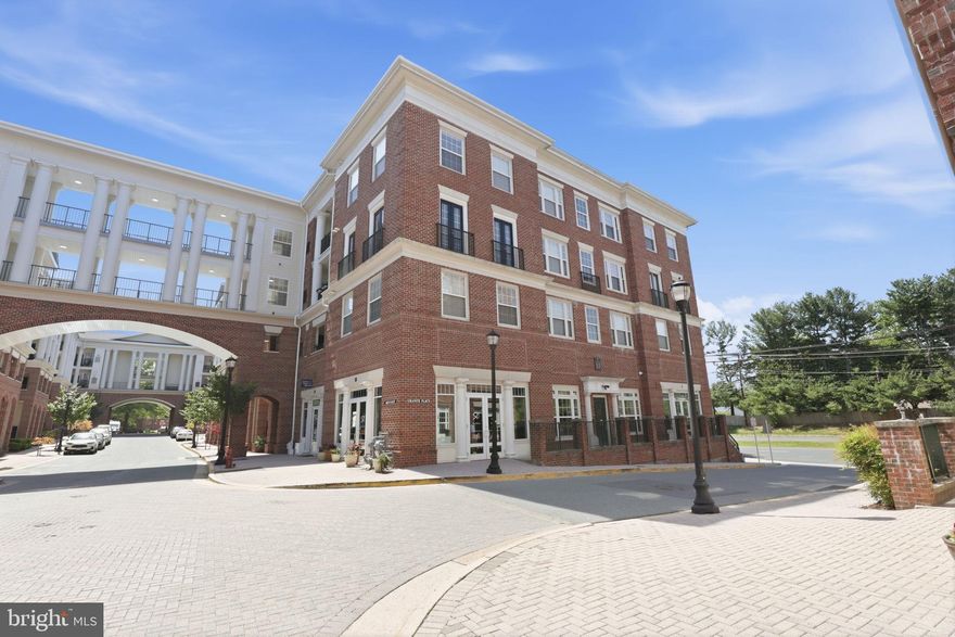 Located in The Colonnade at Kentlands, this 2 bedroom, 2 full bath condo offers one of the community’s most sought-after floor plans...and those don’t come up often.

Freshly painted and truly move-in ready, the layout is both functional and inviting. Hardwood floors run through the main living areas, and the kitchen has been updated with granite countertops and stainless steel appliances. It opens to a dedicated dining space and flows seamlessly into a bright, sun-filled living room with direct access to a private balcony...an easy extension of the living space.

Both bedrooms are generously sized, each with its own en-suite bath and large walk-in closet, offering comfort and privacy that’s not always easy to find in condo living.

The home also includes a garage parking space and access to The Colonnade’s extensive amenities...pool, wine room, library, theater, fitness center, and multiple lounge areas.

All of this in the heart of the Kentlands, with shops, restaurants, groceries and everyday conveniences just minutes away, plus easy access to I-270, 200, and 370.

If you’ve been waiting for the right opportunity in this community, this is one to see.