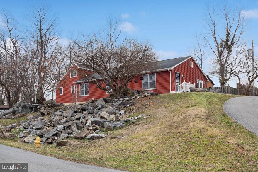 OPEN HOUSE THIS WEEKEND SAT1 - 3! Briarwood Subdivision in Martinsburg, WV - Wonderful established neighborhood with lush landscaping & real yards! Sitting on a hill, you'll find our new listing 806 Mulberry Dr. 1 level - 3 bedrooms, 2 baths with fenced in yard. This home is not your cookie cutter home. From the moment you walk in and are greeted by the great room/kitchen area, you'll notice the hardwood floors, unique cabinetry and built. Both baths have been beautifully updated and are a great size.  There is a newer addition that is an amazing primary bedroom suite, including tongue and groove vaulted ceilings, a tucked away up the rod iron banister is a loft that would make a great office or den and access to the large attic space. this home has been well maintained and updated. Make this your next home. Located minutes from 81, Medical Center, and Downtown. This home won't last long. THERE IS A LARGE DOG ON PREMISES. THE OWNER IS HOME MOST OF THE TIME FOR EASY ACCESS. THEY WILL LEAVE.