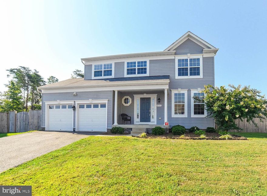Living is easy in this spacious Greenbrier home!The open floor plan encompasses four spacious bedrooms with plenty of room for study, sleep and storage. Hardwood floors, granite counters and stainless steel appliances gleam! Entertaining is easy inside or outside on the freshly stained deck. Plenty of space to play in the fenced, level yard. Dual zone heating & cooling keeps everyone comfortable including your wallet as system still has 4 years left of its 10 year warranty. Unfinished lower level has a rough-in for future bath in addition to tons of storage space. Super convenient to PAX, shopping & dining!