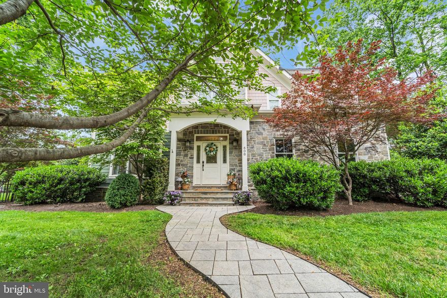 Welcome home to this spacious, custom home in the heart of Falls Church City. Enjoy luxury details inside and out all within walking distance to shops and dining. This home entertains large and small groups beautifully with a grand entrance, powder room, and living space right as you walk in. Flow through a formal dining room and into the comfortable family room, wet bar (with two wine fridges), and eat-in, gourmet kitchen area complete with large butlers pantry for all your storage needs, and convenient mud room connecting to the two-car garage. The family room is large enough to host a big party, yet cozy enough for two in front of the wood burning fireplace. The living space continues to the outside with a screened in porch and amazing outdoor kitchen and living area. Climb the stairs to find your newly renovated primary suite with no detail overlooked. This private retreat features a sitting area with a gas fireplace, generous walk-in closet, and gorgeous en suite, spa bathroom/steam shower you will never want to leave!  The rest of the upper level has three spacious bedrooms with walk-in closets, two additional full baths and a laundry room. Downstairs is the expansive, finished basement with guest suite, full bath, pool table (conveys) room with gas fireplace, exercise room, and recreation space ready to become your home theatre or the play area of your dreams. You will never run out of storage or space!  Brand new HVAC, newer Water Heater, Sump Pump replaced 2024.  Location is everything and this home has walkability to downtown Falls Church while being tucked away on a quiet street -- it's a dream come true.