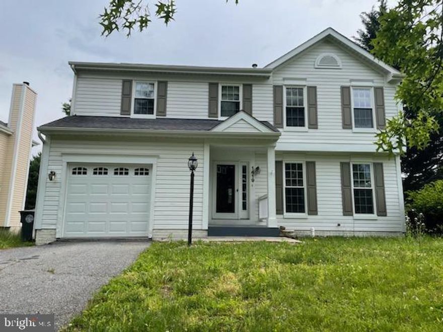 **Back on the market !! PENDING RELEASE ** OFFERS DUE JULY 20th by 8pm
  Stop by and see this lovely 5 bed 3.5 bath with a basement kitchenette and attached garage. Well maintained Hardwood floors throughout. When you walk into the kitchen you will love all the stainless steel appliances while having a relaxing view of your quaint backyard.  Large Deck perfect for entertaining.  Master bathroom has double sinks and plenty of storage space. Built in shelving in main areas . Fully finished walk out basement.