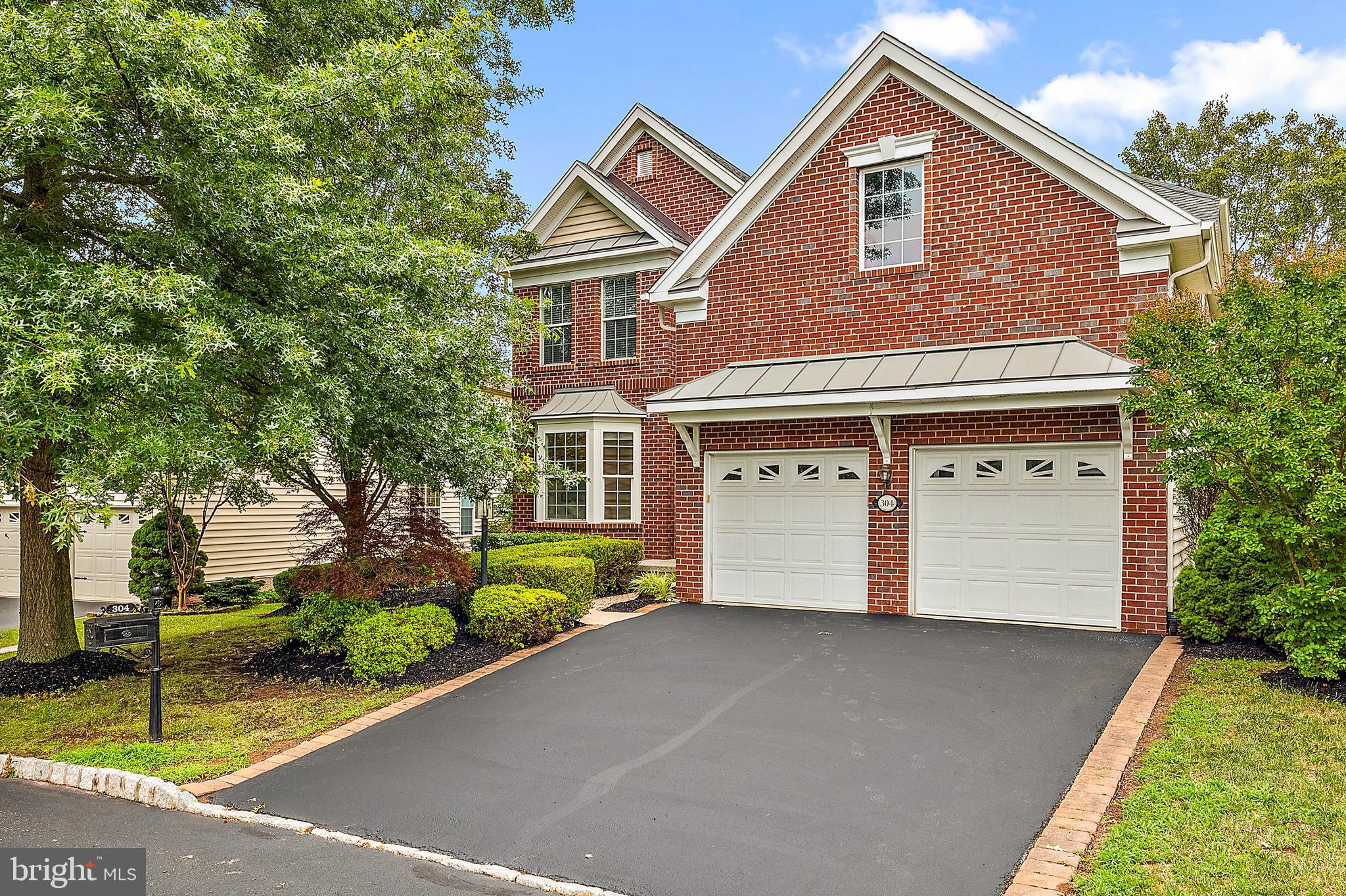 Nestled within the coveted Rivercrest gated community, 304 Quail Drive is a stunning single-family home exuding charm and sophistication. Pride of ownership shows with the brand new carpeting on the main and second floor along with a fresh new coat of paint, perfect for any style decor. The grand two-story entryway welcomes you with its gleaming hardwood floors that lead seamlessly into the home's open-concept living areas. Immediately to your left, a spacious sitting room awaits, featuring newer carpeting and a bay window that bathes the space in natural light. The formal dining room, adorned with a centered chandelier and elegant crown molding, provides an inviting atmosphere for gatherings and offers direct access to the open kitchen. The kitchen boasts an abundance of cherry cabinetry, a stylish tile backsplash, and neutral Corian countertops. A large island with seating, coordinating black appliances, and a convenient corner pantry complete this culinary haven. Adjacent to the kitchen, is the eat-in dining area where you'll find double doors to a serene back deck, perfect for al fresco dining. The large deck has been updated and repainted to ensure a peaceful relaxation space. The expansive family room, highlighted by a marble fireplace and picture windows, creates a cozy yet elegant space for relaxation. A private hallway off the main living area leads to a convenient study and a powder room, ideal for daily use and guest convenience. Ascend to the second floor, where the master suite offers a tranquil retreat with a spacious sitting area and a luxurious en-suite bathroom featuring a whirlpool tub, skylight, and double vanity. Two additional generously sized bedrooms and a guest bathroom complete this level, providing ample space for family or guests. The incredible finished walk-out basement is an entertainer’s paradise, featuring a home theatre setup and a granite wet bar, perfect for hosting gatherings. A second powder room adds to the basement’s allure. Step outside onto the beautiful paver patio to enjoy the peaceful surroundings and lush landscaping. The installation of the brand new AC ensure comfort for summers to come and peace of mind with this major component already being replaced. This exquisite home is located within the highly regarded Springford School District and offers easy access to the Providence Town Center, shopping, major highways, and numerous employment opportunities. Experience the perfect blend of elegance, comfort, and convenience at 304 Quail Drive.