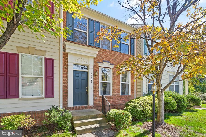 OPEN HOUSE October 22nd from 1 PM to 4 PM - Broadlands Townhouse backing to Trees - Fantastic Kitchen with Center Island, Quartz Counters, Stainless Appliances & Tile Backsplash - Separate Pantry for Extra Storage - Easy Access to Rear Deck from Kitchen - New Carpet on all Floors - Upper Level Features 3 Bedrooms and 2 Full Baths - Primary Bedroom highlighted by Vaulted Ceilings, View of Trees, and Walk-in Closet - Lower Level Recreation Room with Gas Fireplace, Built-in Shelving and Walk-out to Rear Yard - 3 Piece Rough-in for Future 3rd Full Bath in the Lower Level - Upgrades Include Roof-2018, HVAC-2015, Water Heater - 2022,  Dishwasher-2021,  Refrigerator-2016,  Stove-2020,  Kitchen Floors-2022, and Carpet-2023 - Finished Square Feet of 1,992- Minutes to the Dulles Toll Road & Harris Teeter - Under 10 Miles to Dulles International Airport - Briar Woods High School Pyramid