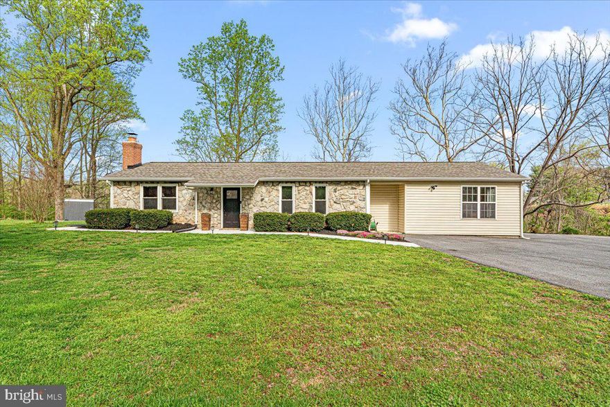 Welcome to this fully renovated Rancher with NO HOA or City taxes! This home offers a private setting with year round wildlife and mature trees while still close proximity to everything Frederick has to offer. Enter into an open floor plan with cathedral ceilings, LVP flooring and fresh paint throughout. The living room offers a wood burning fireplace and custom shades. The bright kitchen offers granite countertops and stainless steel appliances. The main lever offers a primary suite with cathedral ceilings, en-suite bathroom with double vanity and enclosed shower, three additional bedrooms and a shared full bathroom. Plenty of parking on the asphalt driveway and parking pad. Enjoy a summer evening with friends and family on the concrete patio. Whole house water softener and filtration system, new well pump, Ecobee thermostat installed, new insulation in the attic, wet switch installed that automatically kicks off heating/air if water is detected, replaced the back part of the electrical panel, septic system is about 2 years old. Roof and HVAC about 3 years old. Welcome home!
