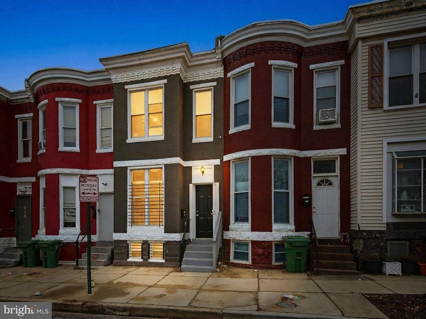 If you are looking to live in Baltimore city in a fully renovated home, this beautiful townhome located at Mount Clare neighborhood is now available. Conveniently located within approximately one mile of Carroll Park and the Westside Shopping Center, with easy access to major traffic including S. Monroe Street and Wilkens Avenue. This three-level home offers 5 bedrooms and 3 full bathrooms, providing plenty of space and flexibility. The main level features a bright open-concept layout highlighted by a stylish accent wall and a brand-new kitchen complete with a modern peninsula, quartz countertops, stainless steel appliances, custom backsplash, recessed lighting, and contemporary finishes throughout. The upper level offers three bedrooms, balcony, this level includes a primary suite with a private full bathroom for added comfort and privacy. The fully finished lower level provides additional living space with two nicely sized bedrooms, a full bathroom, and washer and dryer included . This move-in-ready home combines modern updates with a convenient city location, making it a great opportunity for homeowners or investors alike. Schedule your showing today!