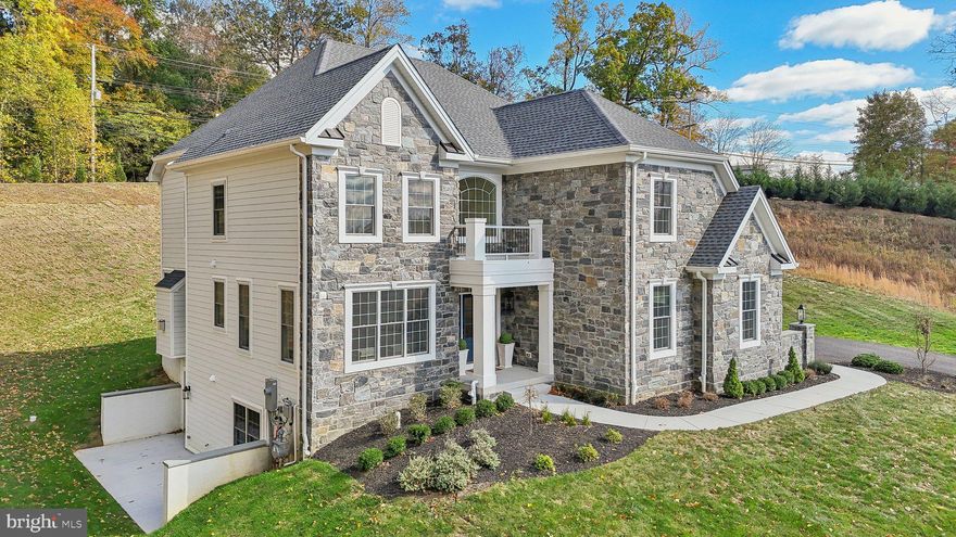 Welcome to the NEW Carlisle West Model Home at Village of Four Seasons - completed and AVAILABLE FOR IMMEDIATE OCCUPANCY!   We have added to our beautiful Included Features with additional Designer Details, and this is a Must-See home!  VILLAGE OF FOUR SEASONS is an enclave of only 38 residences built on approximately one-acre lots, with this model home situated at the end of the cul-de-sac on a 1.45-acre homesite!
The Carlisle West floor plan embraces easy entertaining and everyday living, and you are warmly welcomed by a sunny two-story Foyer with a gracious sweeping staircase and entry to the Living Room.  The Dining Room is complimented with wainscot trim detail and twin windows framing the spacious outdoor view.  Step into the Gourmet Kitchen - with tall white painted cabinets, gleaming quartz countertops, and beautiful tile backsplash, along with a new center island design, Stainless Steel Appliance Package, all overlooking the Breakfast Area and Cozy Family Room with Fireplace and tall windows.  Also on this level, a conveniently located Powder Room and an additional Walk-In Storage Closet with access from the Hall, sized for a future Elevator, along with separate Hall Entrance with dual Closets and the two-car Garage.  The Second Floor offers a generous Primary Bedroom Suite featuring a Dual Designed Walk-In Closet and a Luxurious Spa Bathroom with Separate Vanities, Free-Standing Tub, Spacious Shower, and Water Closet.  Three Additional Bedrooms, Two Full Bathrooms, a convenient Laundry Room, and plenty of closet space complete this level!  Enjoy the Lower-Level Flex Space with Full Bathroom, Bedroom or Den, Daylight Windows and Walk Out Entrance to a Side Garden Patio!  The approximate total square footage includes the Finished Space in the Lower Level.  Sodded yard and enhanced landscape package included!   We are meeting by appointment only, so call today to schedule a tour of this beautiful model home!  Public Water, Public Sewer, and Natural Gas.