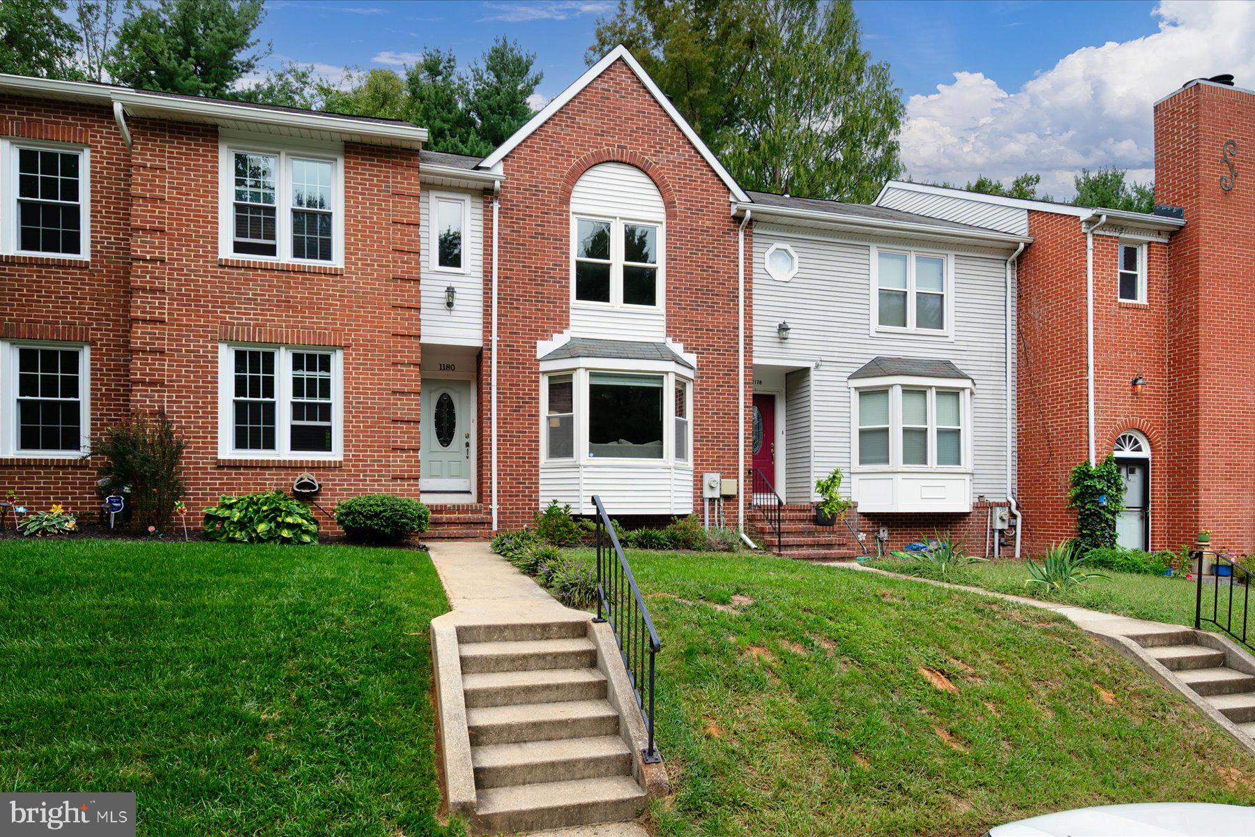 Welcome to 1180 Mosswood in the desirable Ulmstead Gardens community of Arnold. This three-bedroom, four-bathroom townhome combines modern updates with a convenient location near shopping, dining, and the B&A Trail. The main level offers a spacious living room, dining area, and kitchen with stainless steel appliances. Upstairs, the primary suite includes a private full bath, with two additional bedrooms and another full bath completing the level. A finished lower level features a large family room with a wood-burning fireplace, half bath, and generous utility/storage space. Enjoy the outdoors on the deck and patio overlooking trees. Residents of Ulmstead Gardens enjoy community amenities including a playground, sports courts, open green space, and sidewalks throughout the neighborhood. With its versatile layout, move-in ready appeal, and access to Ulmstead Gardens’ amenities, this home is a fantastic opportunity.