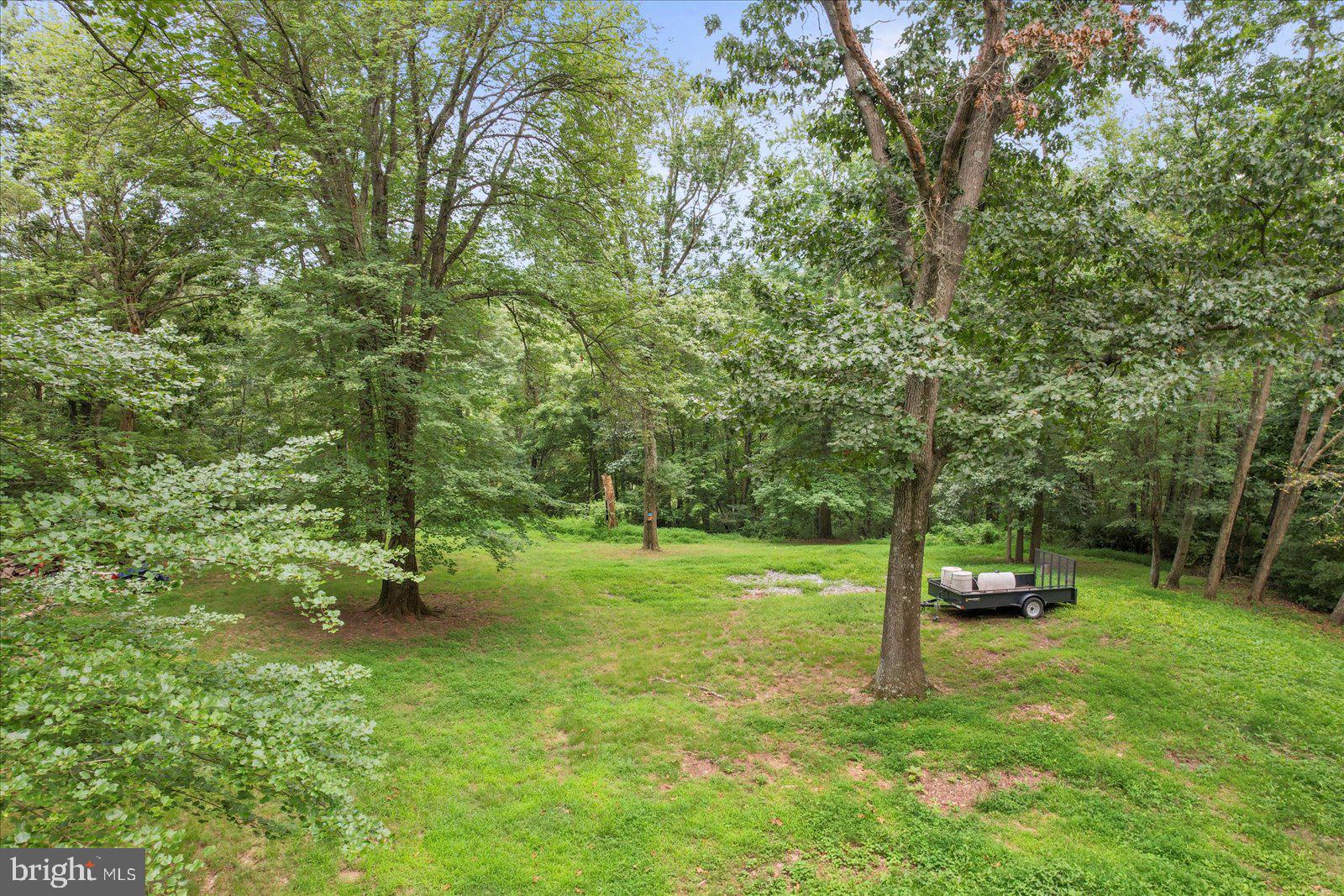 This 1.6-acre parcel offers the perfect balance of privacy and accessibility. Tucked away just off a public road, the property provides a peaceful, secluded setting with beautiful views, while still being easy to reach. Partially cleared and ready for your plans, this land comes with no builder restrictions—making it a great option for a custom home or a mobile home. Whether you're looking to create a full-time residence or a quiet retreat, this property presents a rare opportunity to build without limitations in a tranquil setting.