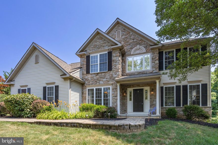 Open House Cancelled -This home in the Twin Valley School District has all the space you’ll need. Complete with a new roof and new HVAC! This open floor plan complete with a split staircase takes you from a 2-story entrance to a 2-story family room. Hardwood floors flow through the foyer, dining room and into the large eat in kitchen. The kitchen features a granite countertop center island, stone tile backsplash, stainless microwave & dishwasher. The custom made pantry “barn doors” give just a touch of rustic feel while having updated amenities throughout. Newer carpet in the living room, office and upstairs hallway. Custom interior trim surrounds all first floor windows along with a custom mantel around the fireplace. This home comes with a convenient, yet beautifully concealed elevator that accesses all 3 levels of this home from the basement to the 2nd floor. The 1st floor laundry room and powder room complete this main level. Moving up to the 2nd floor you have the grand master suite with a spacious bedroom, large walk-in closet and a master bath complete with soaking tub. 3 additional bedrooms plus that dramatic view down into the family room. From the sunroom, you step through the french door onto a beautiful 400 sq ft cement paver patio. This 1.5 acre flare lot backs to woods for privacy and nature. A new roof was installed in 2022 with warranty Plus a brand new HVAC system with warranty! A full basement, 2 car garage, low taxes, all in a 21 house development setting with NO association and NO fees.