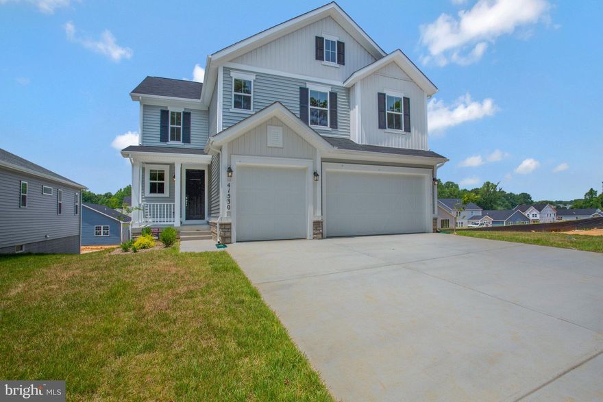 ASK ABOUT SPECIAL FINANCING!

BRAND NEW MOVE IN READY HOME! Ask about special financing! This Yorktown offers expansive entertaining space at the back of the home: the great room with beautiful fireplace, dining room overlooking the backyard, and the kitchen with a large center island. The 3- car garage leads to a convenient mudroom with walk-in closet and keydrop, a powder room and a private study. On the second floor, there is an immense loft surrounded by three bedrooms, a shared bath, laundry room and a primary suite with its own bath and spacious walk-in closet and an upgraded deluxe bath. There is a finished walk out basement including a rec room and full bath. Clarks Rest boasts a range of resort-style amenities, including a clubhouse, pools, sports courts, playgrounds, walking trails and more. The neighborhood’s prime location also offers close proximity to the notable schools, unique shops, art galleries, dining and waterfront attractions of historic Leonardtown, as well as convenient commutes to Washington D.C., Alexandria, Waldorf and major employers such as Pax Naval Base. Sales centers are OPEN but visitors are encouraged to call ahead to be guaranteed a dedicated appointment. Virtual appointments are available as well. Contact builder for current incentives!