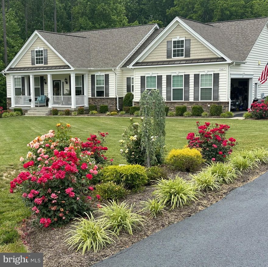 Beautiful and meticulously maintained 4-bedroom, 3.5-bath rambler offering nearly 3900 finished square feet of living space in the highly desirable Oakwood Estates Community, in Dahlgren, Virginia. Situated on a quiet, private 1-acre lot bordered by mature trees along the side and rear, this home delivers both privacy and convenience in an exceptional setting.
 The main level features an open concept design with 9-foot ceilings, hardwood flooring throughout the main living areas, and a spacious family room that flows seamlessly into the large custom kitchen and breakfast area. The kitchen is well appointed with custom cabinetry and offers an ideal layout for both everyday living and entertaining. The breakfast area opens directly to the rear deck, extending the living space outdoors. A formal dining area and expansive living space complete the first-floor entertainment flow.
  The primary suite includes a tray ceiling and a well-appointed en-suite bath. Additional main-level bedrooms are generously sized, each with comfortable layouts and carpeting.
 The finished lower level-professionally completed by builder-adds significant living space and versatility, featuring a large family room, sitting area, and an impressive partially soundproofed 17x28 media, music, or home theater room. In addition, a 4th bedroom and full bath are included on lower level. The lower level is 75% finished and includes additional conditioned unfinished space of 1000 square feet for storage.
  Outdoor living is equally impressive with a custom rear patio and sidewalk leading to the walkout entrance to lower level. The underside of the deck has been finished to a mini garage with electric to house lawn tractor, patio furniture and other hobbies and implements.
Additional space includes an oversized 2+ car garage, and expanded driveway that can accommodate 10+ vehicles, offering exceptional parking convenience for gatherings and guests.
  Residents of Oakwood Estates enjoy community amenities including a pool, playground and Recreation Center located within easy-walking distance from the home. With over $100,000 in thoughtful improvements and a location within a rapidly appreciating community where new construction in the next and final section is averaging significantly higher price points, this home presents an outstanding opportunity for turnkey living in a highly sought after neighborhood.